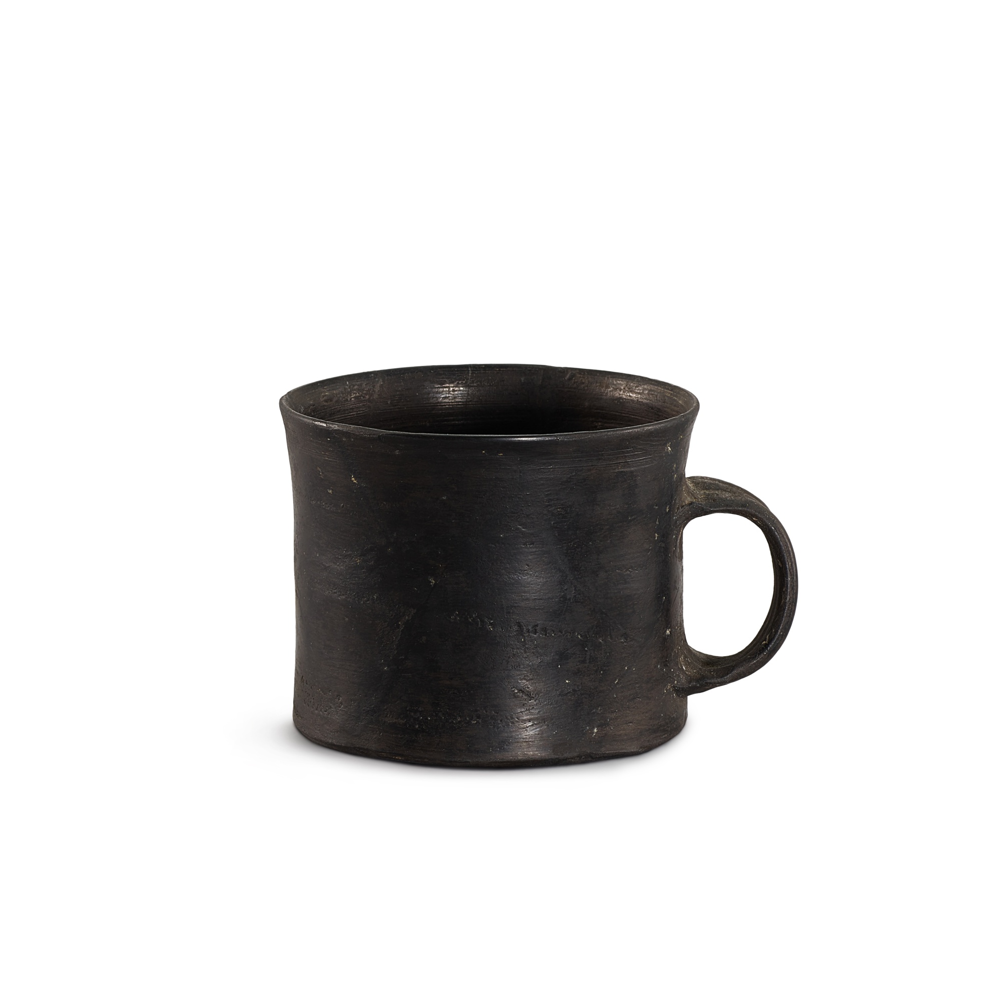 A small black pottery cup, — A small black pottery cup, Longshan culture, c. 2500-2000 B.C. 龍山文化 黑陶盃