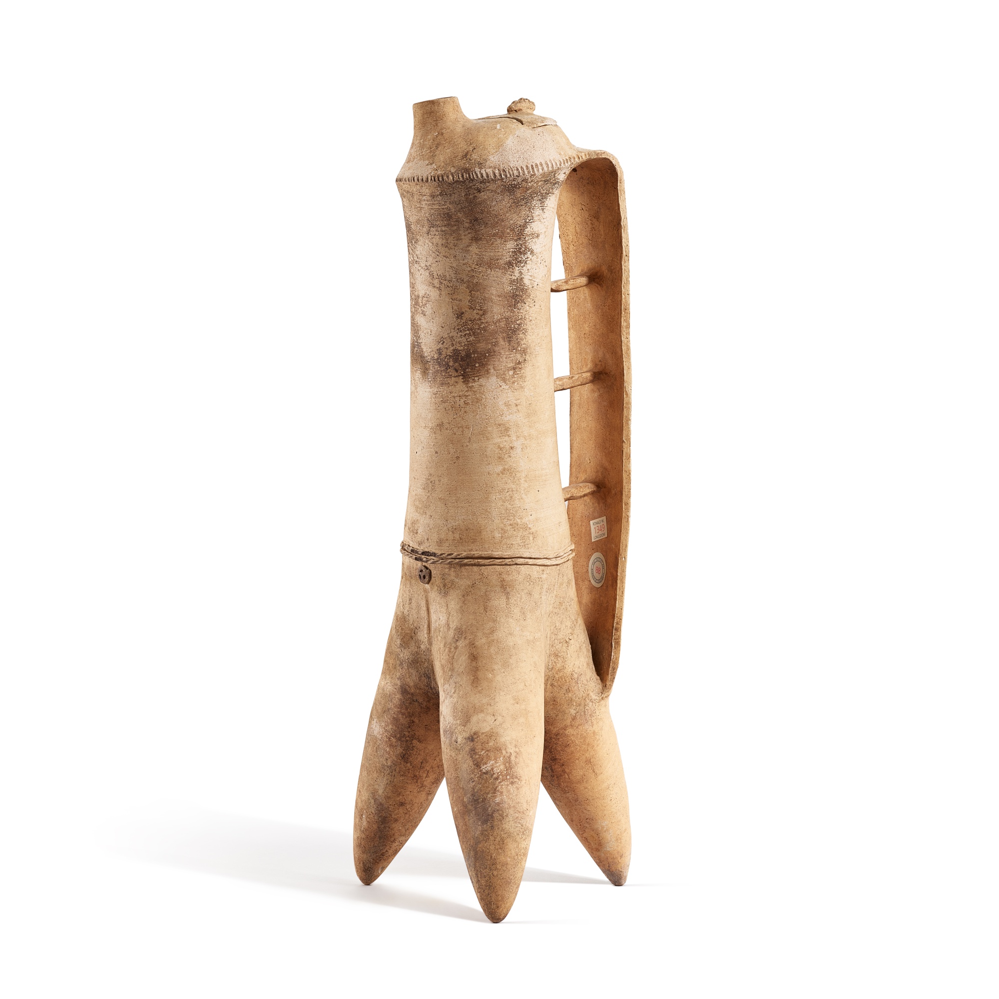 A tall white pottery tripod ewer, — A tall white pottery tripod ewer, Early Bronze Age, early 2nd millennium B.C. 青銅器時代初 白陶盉