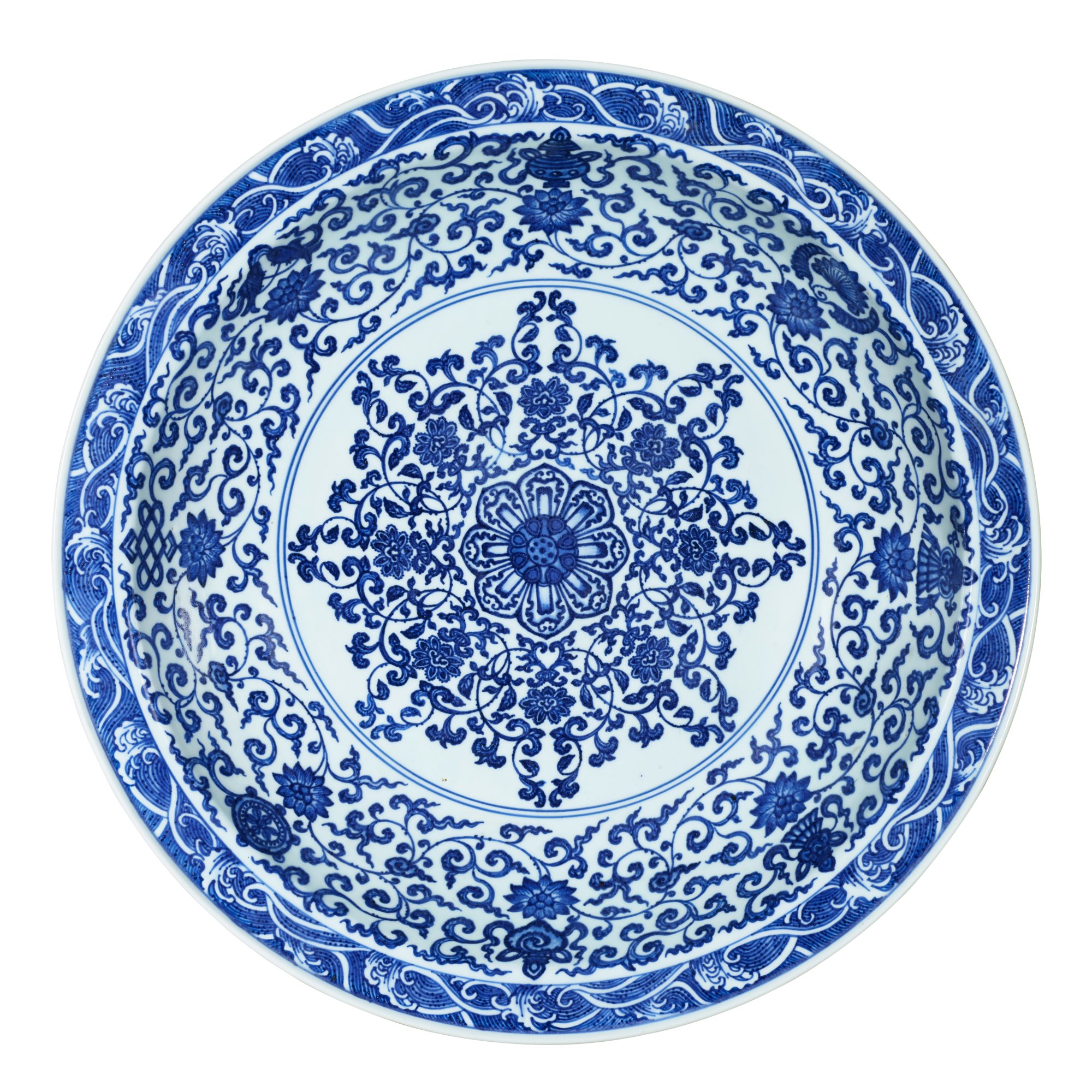 A blue and white 'bajixiang' charger — 清雍正 青花寶相花蓮托八吉祥紋折沿大盤 《大清雍正年製》款