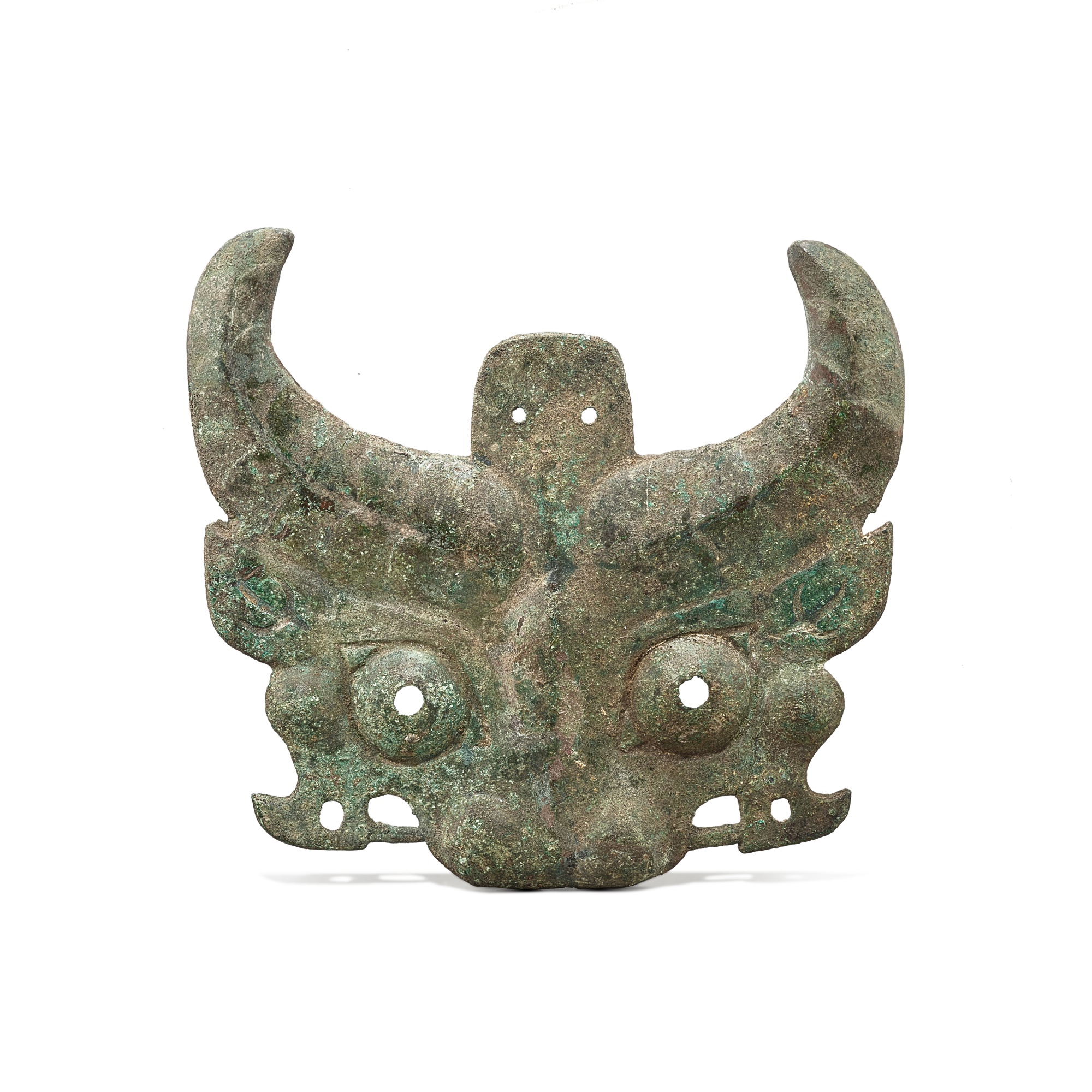 A bronze 'mythical beast' mask, — A bronze 'mythical beast' mask, Western Zhou dynasty 西周 青銅獸面紋牌飾
