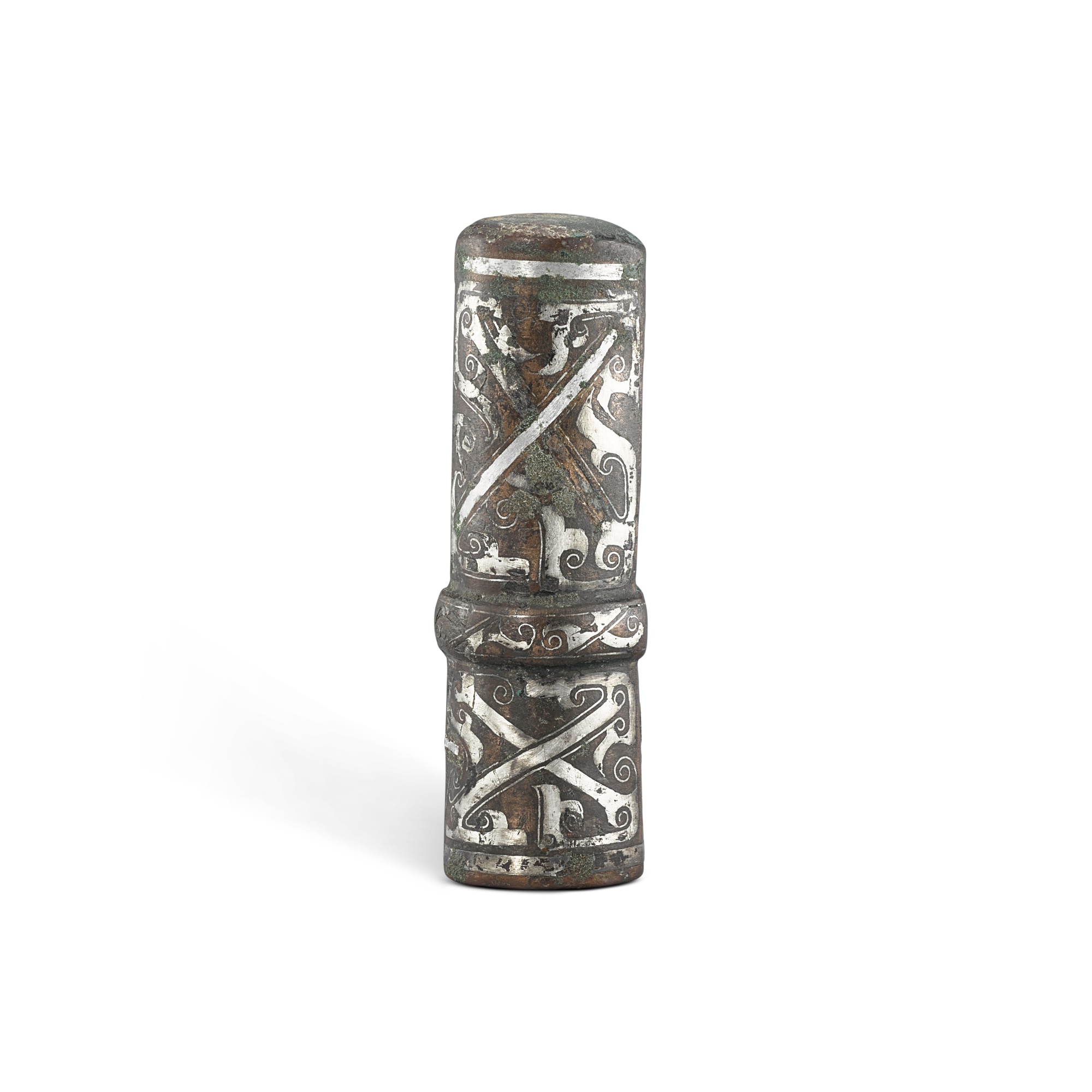 A silver-inlaid bronze chariot fitting, — A silver-inlaid bronze chariot fitting, Eastern Zhou dynasty, Warring States period - Han dynasty 東周戰國時期至漢　銅錯銀車馬飾