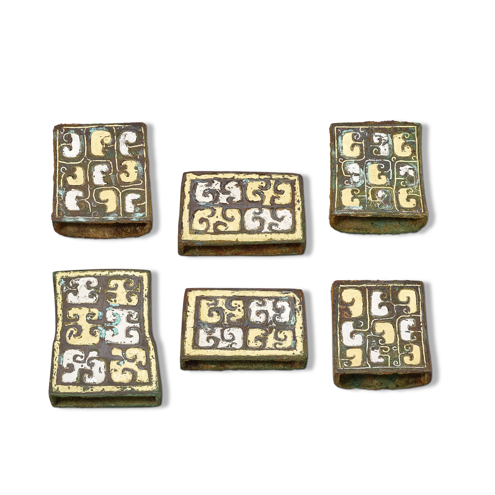 A group of six gold and silver-inlaid bronze fittings, — A group of six gold and silver-inlaid bronze fittings, Eastern Zhou dynasty, Warring States period 東周戰國時期 銅錯金銀車馬飾一組六件