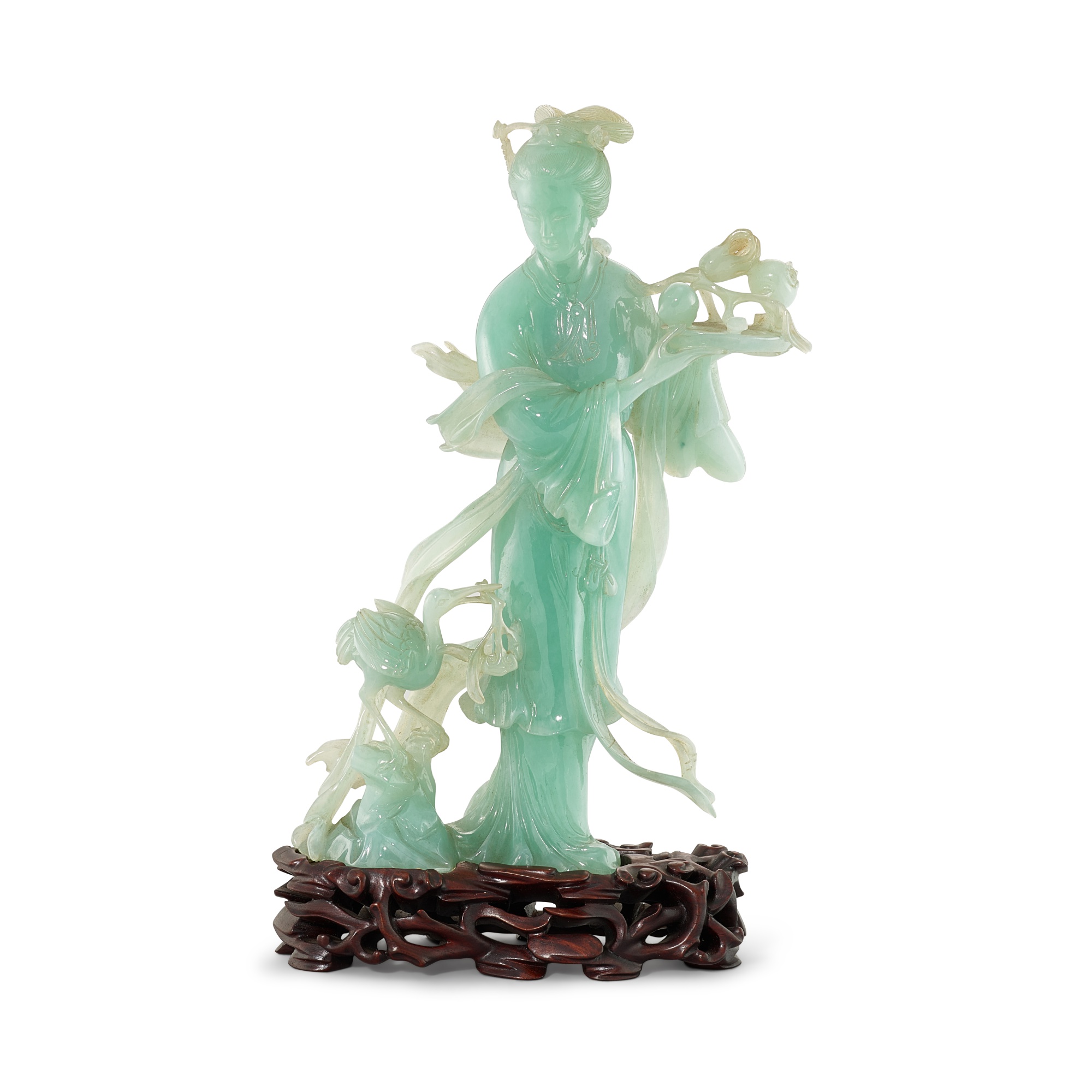 A jadeite figure of a female immortal, — A jadeite figure of a female immortal, 20th century 二十世紀 翠玉仙女獻壽立像
