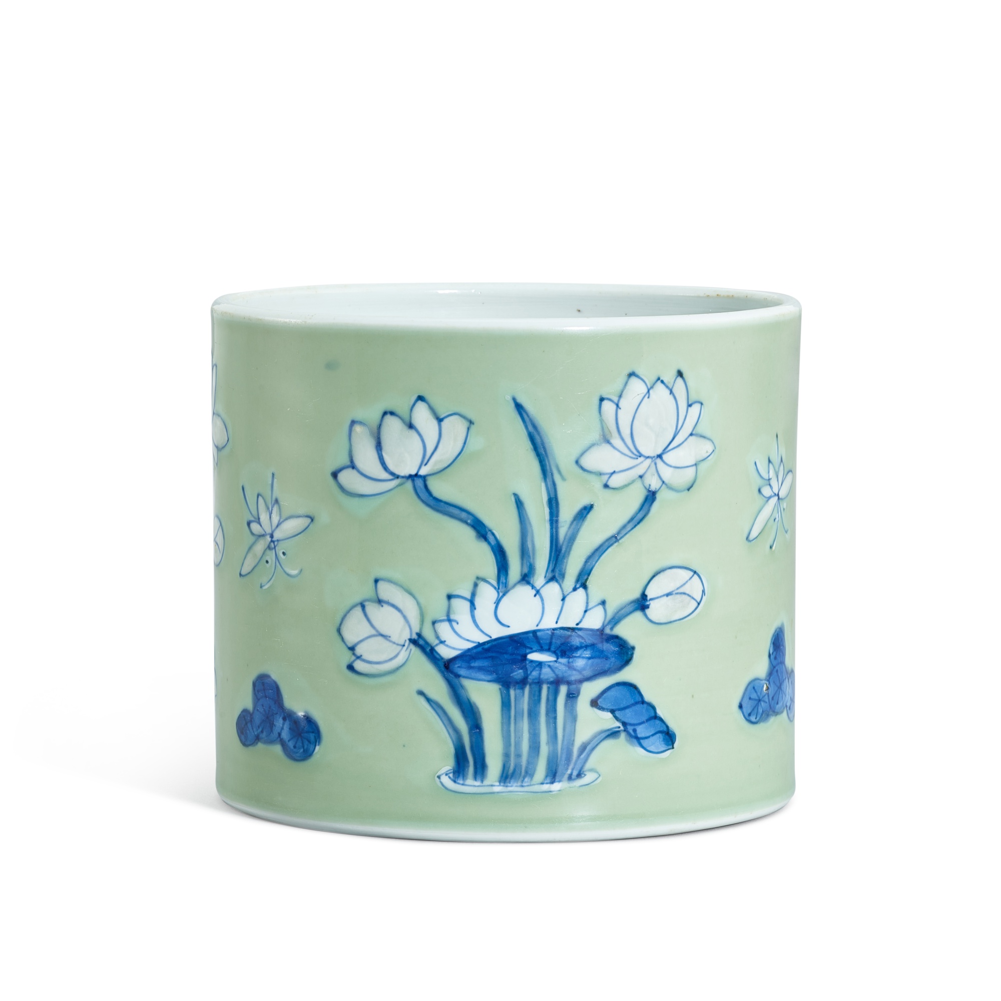A celadon-ground underglaze-blue 'lotus pond' brushpot, — A celadon-ground underglaze-blue 'lotus pond' brushpot, Qing dynasty, Kangxi period 清康熙 粉青地青花荷塘紋筆筒