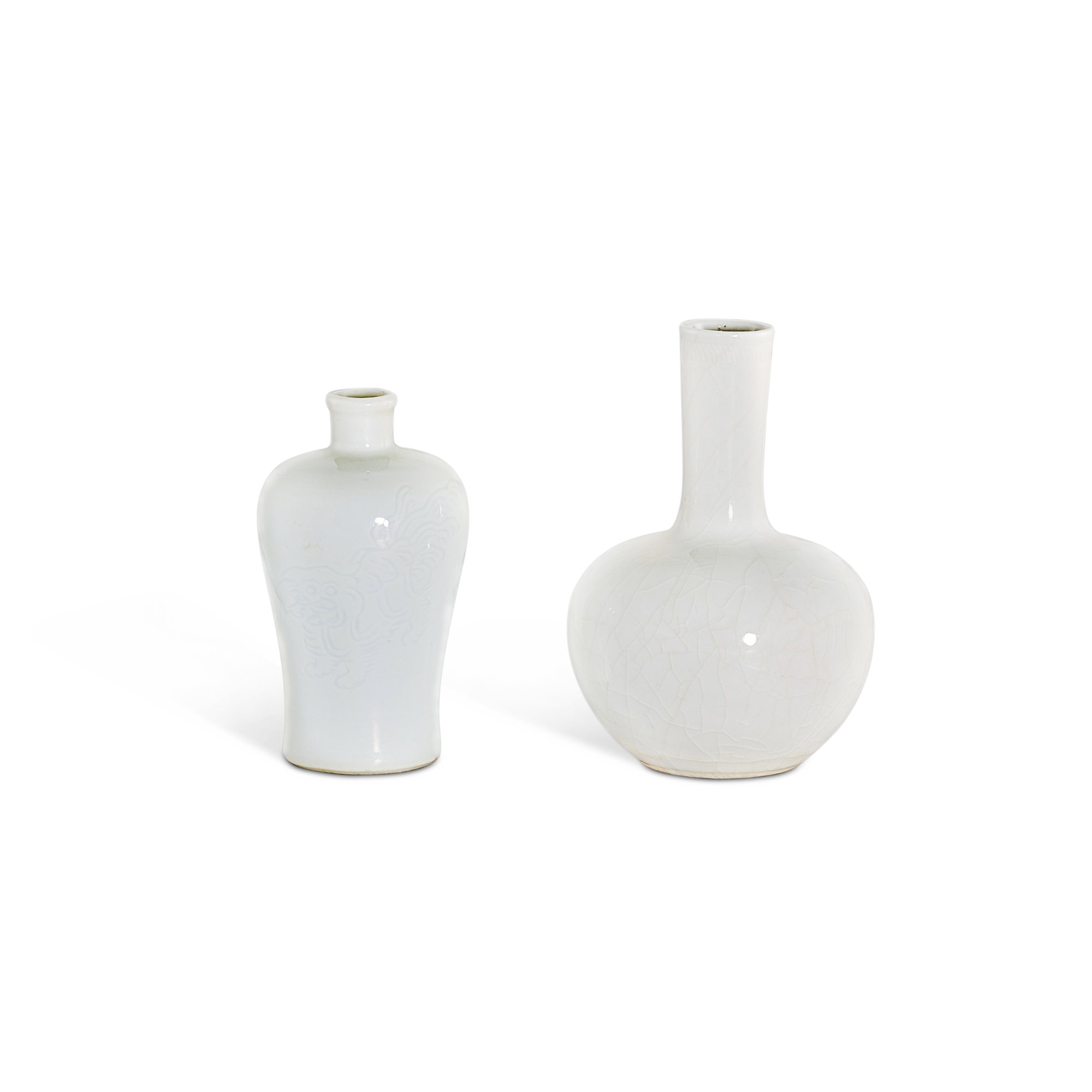 Two small white-glazed vases,
