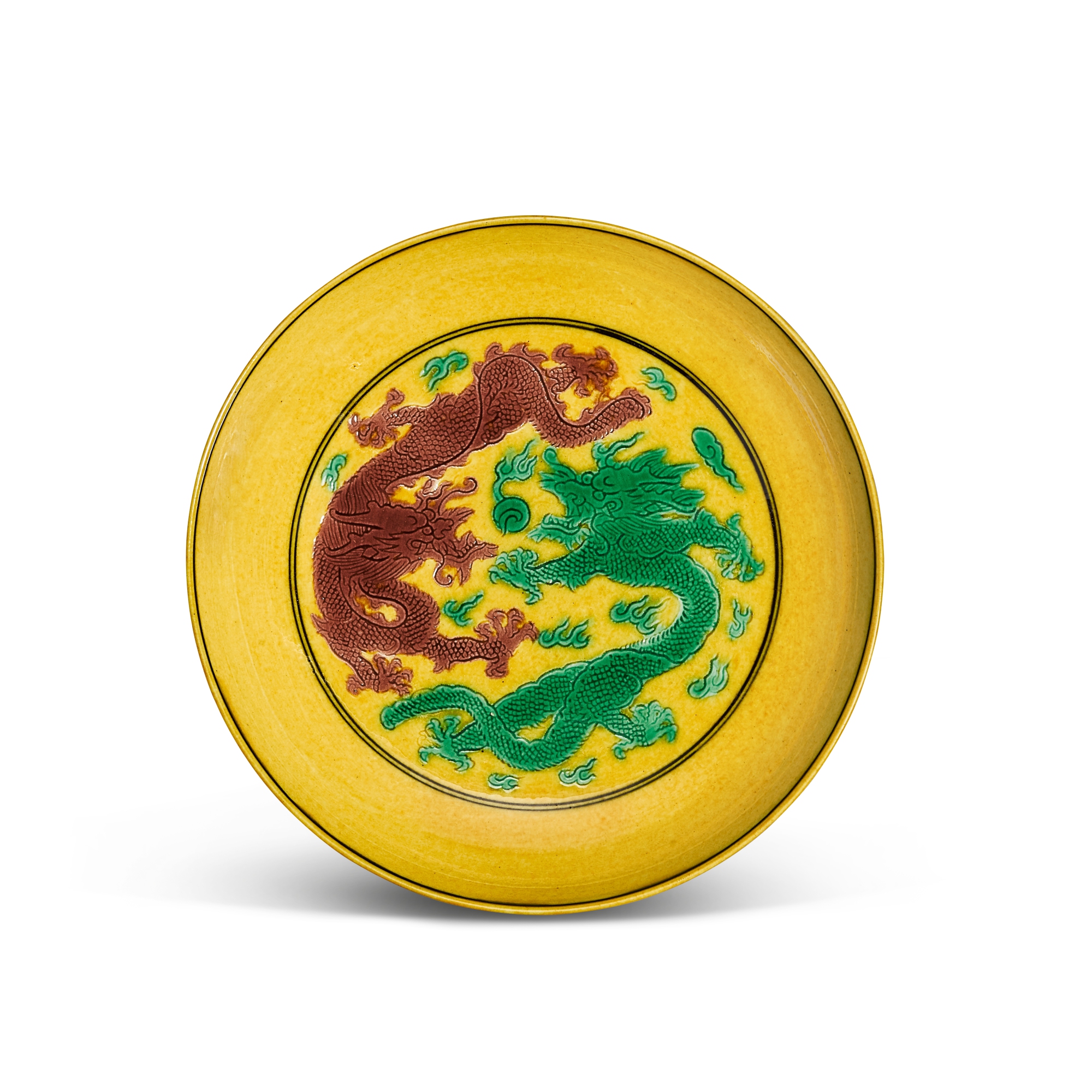 A yellow-ground green-and-aubergine-enamelled 'dragon' dish, — A yellow-ground green-and-aubergine-enamelled 'dragon' dish, Mark and period of Guangxu 清光緒 黃地紫綠彩葡萄雲龍紋盤 《大清光緒年製》款