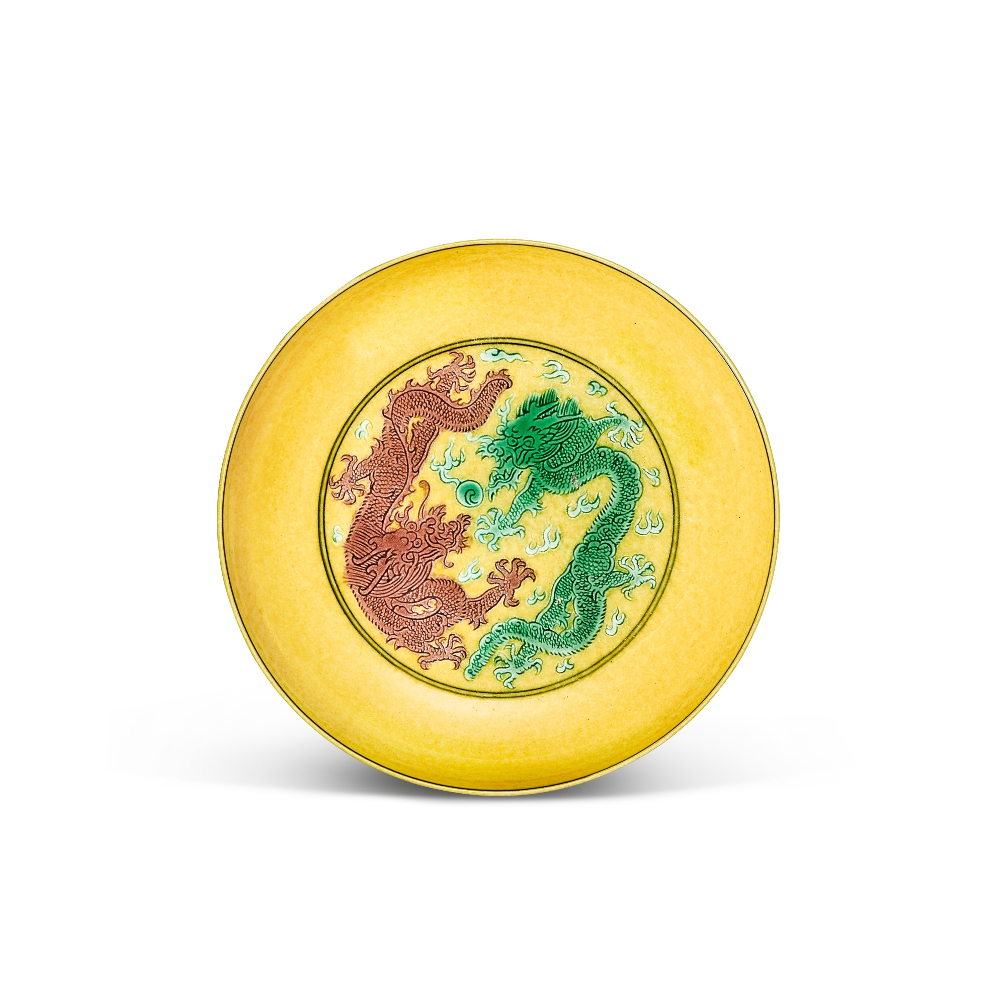 A yellow-ground green and aubergine-enamelled 'dragon and crane' dish, — A yellow-ground green and aubergine-enamelled 'dragon and crane' dish, Mark and period of Guangxu 清光緒 黃地紫綠彩雙龍雲鶴紋盤 《大清光緒年製》款