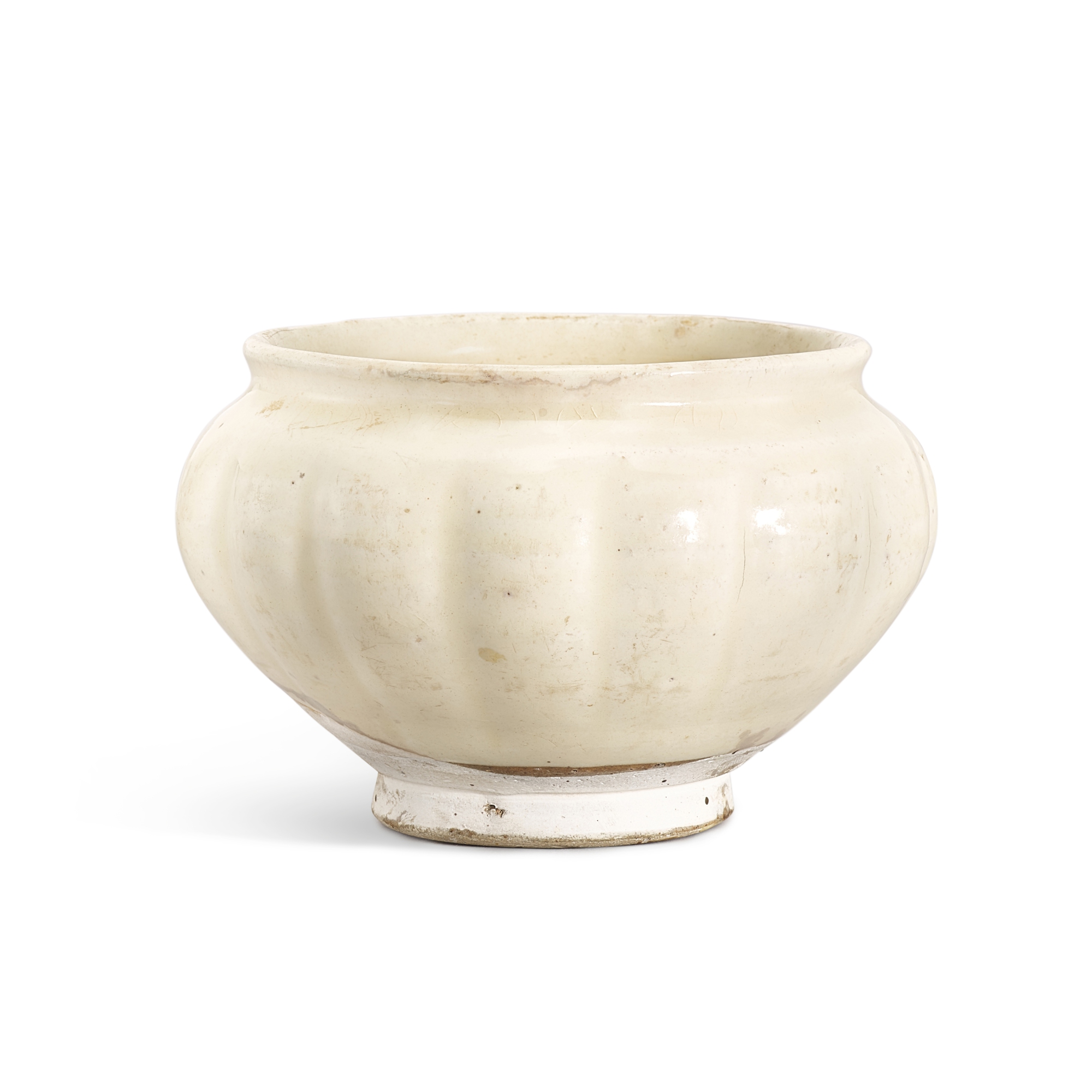 A white-glazed lobed bowl, — A white-glazed lobed bowl, Northern Song dynasty 北宋 白釉瓜棱式缽
