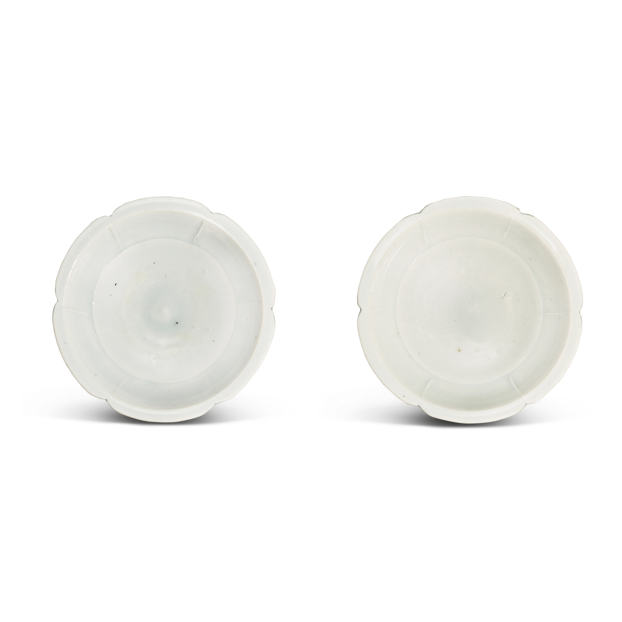 A pair of small qingbai lobed dishes, — A pair of small qingbai lobed dishes, Song dynasty 宋 青白釉花口小盤一對
