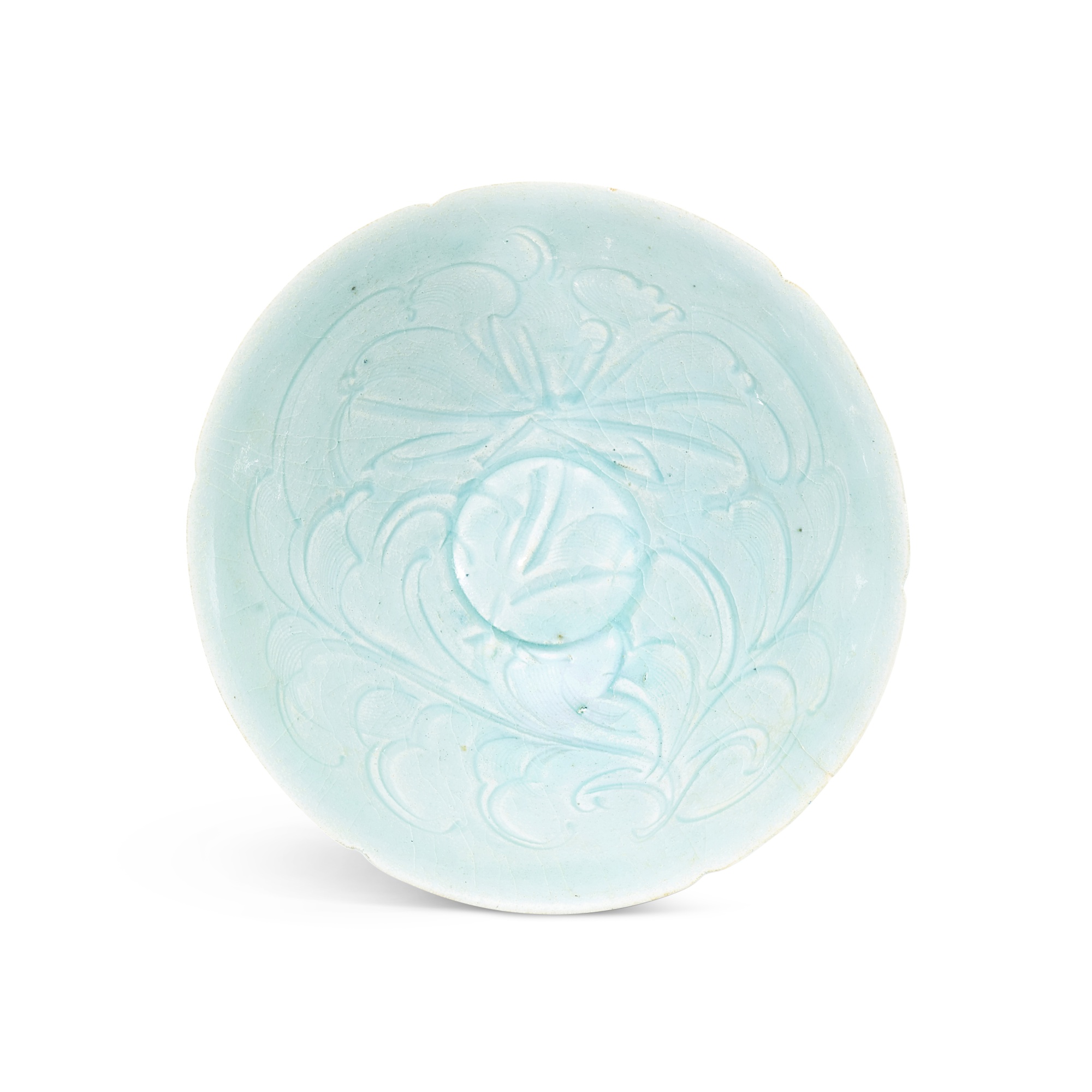 A qingbai carved 'peony' bowl, — A qingbai carved 'peony' bowl, Song dynasty 宋 青白釉刻牡丹紋笠式盌