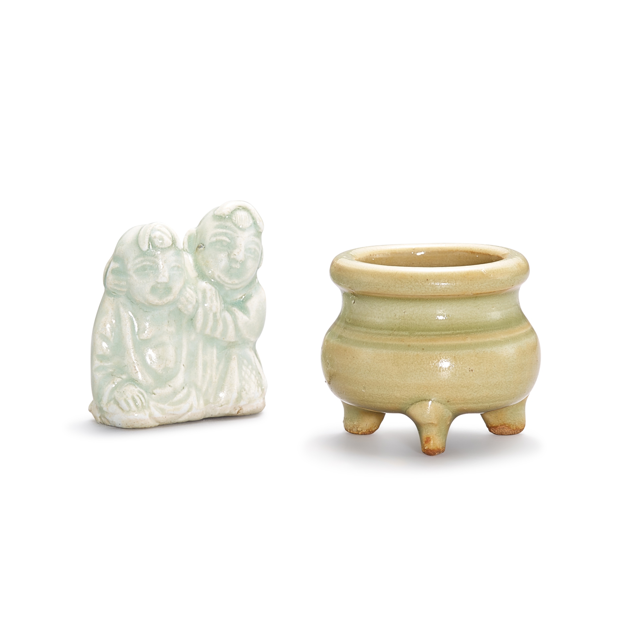 Unknown (Historical) — A small Yaozhou celadon tripod censer and a qingbai figure of two boys, Song dynasty 宋 耀州窰青釉三足爐 及 青白釉童子