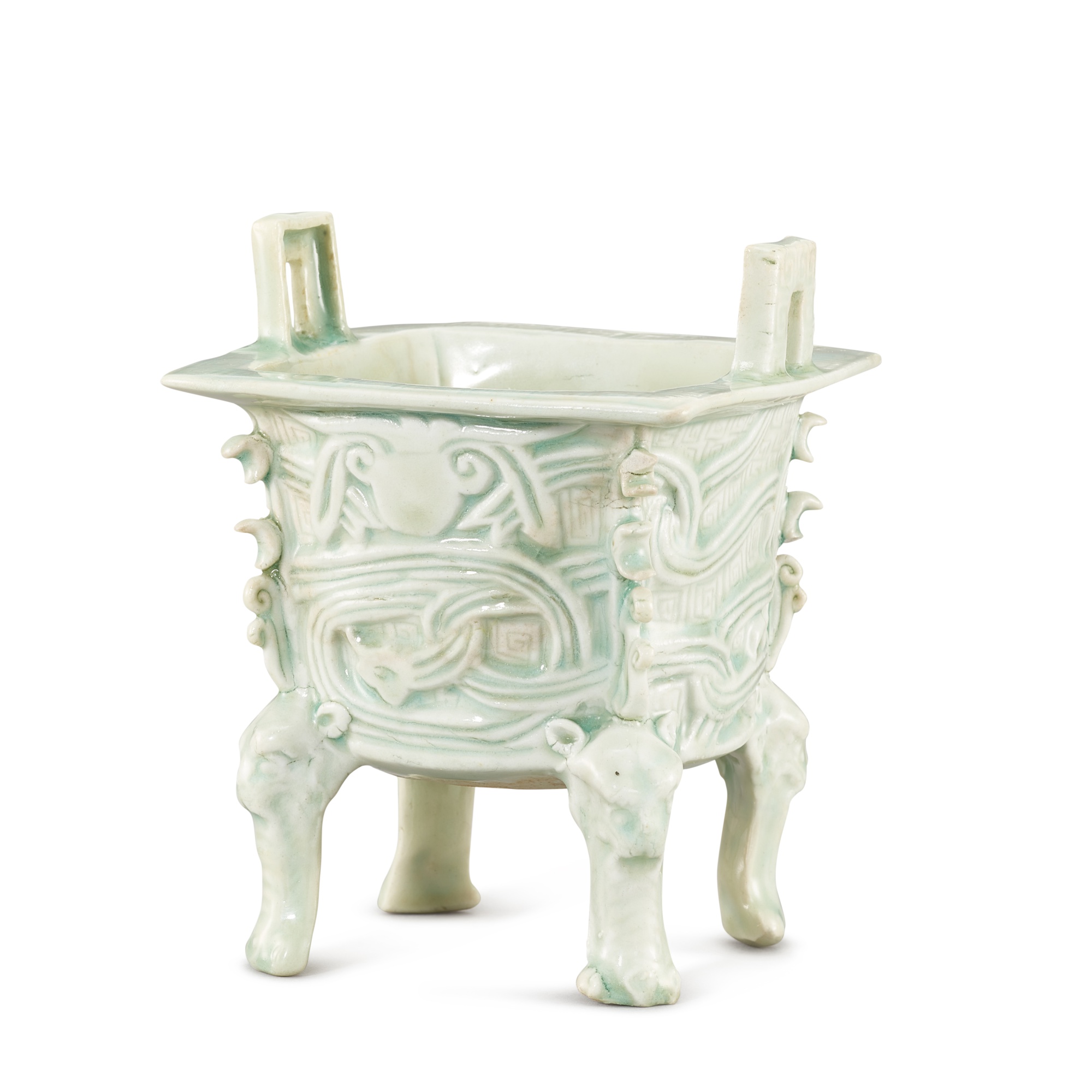 A superb qingbai archaistic incense burner, — A superb qingbai archaistic incense burner, Southern Song – Yuan dynasty 南宋至元 青白釉仿古四足爐