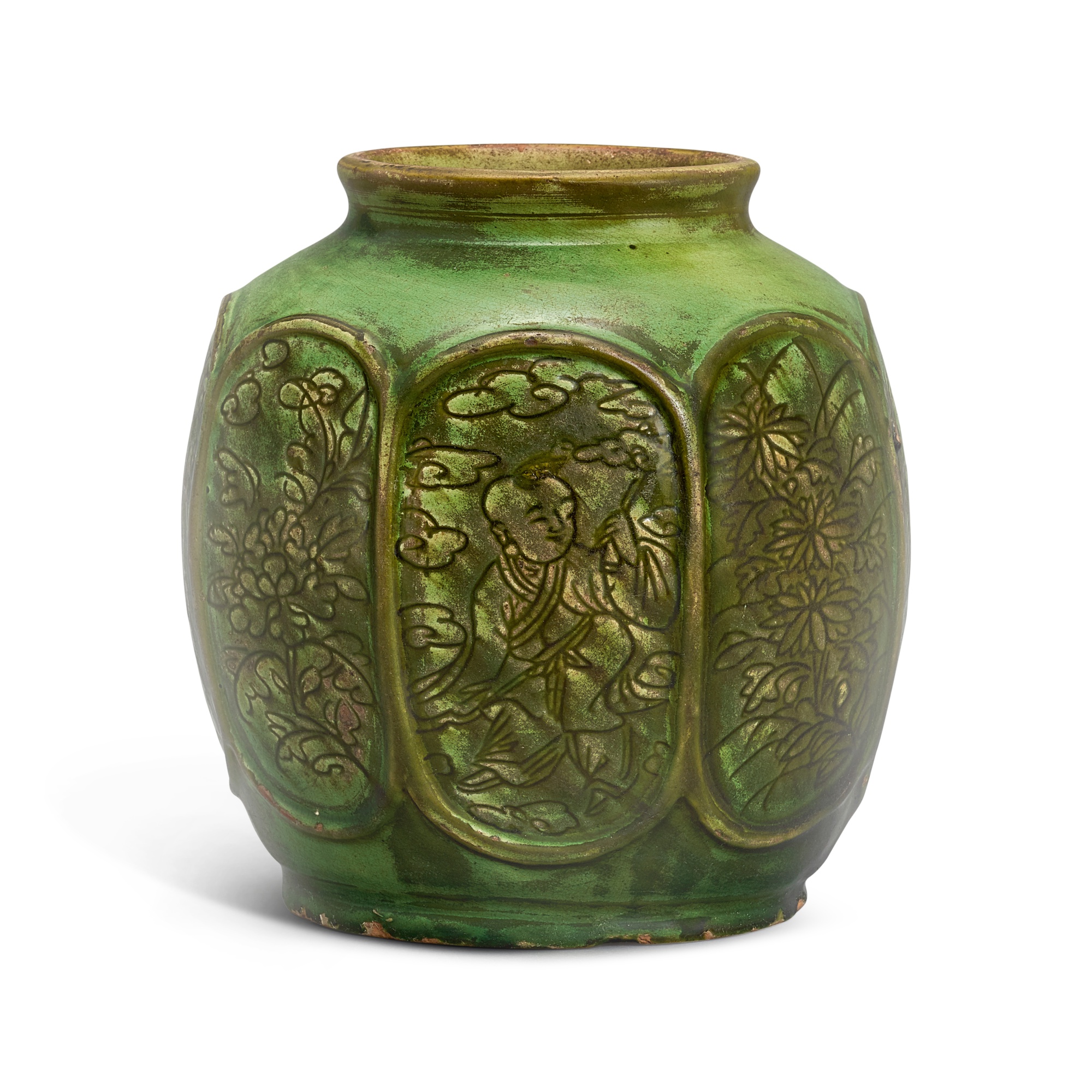 A green-glazed carved 'boys' jar, — A green-glazed carved 'boys' jar, Ming dynasty 明 綠釉八方開光童子花卉紋罐
