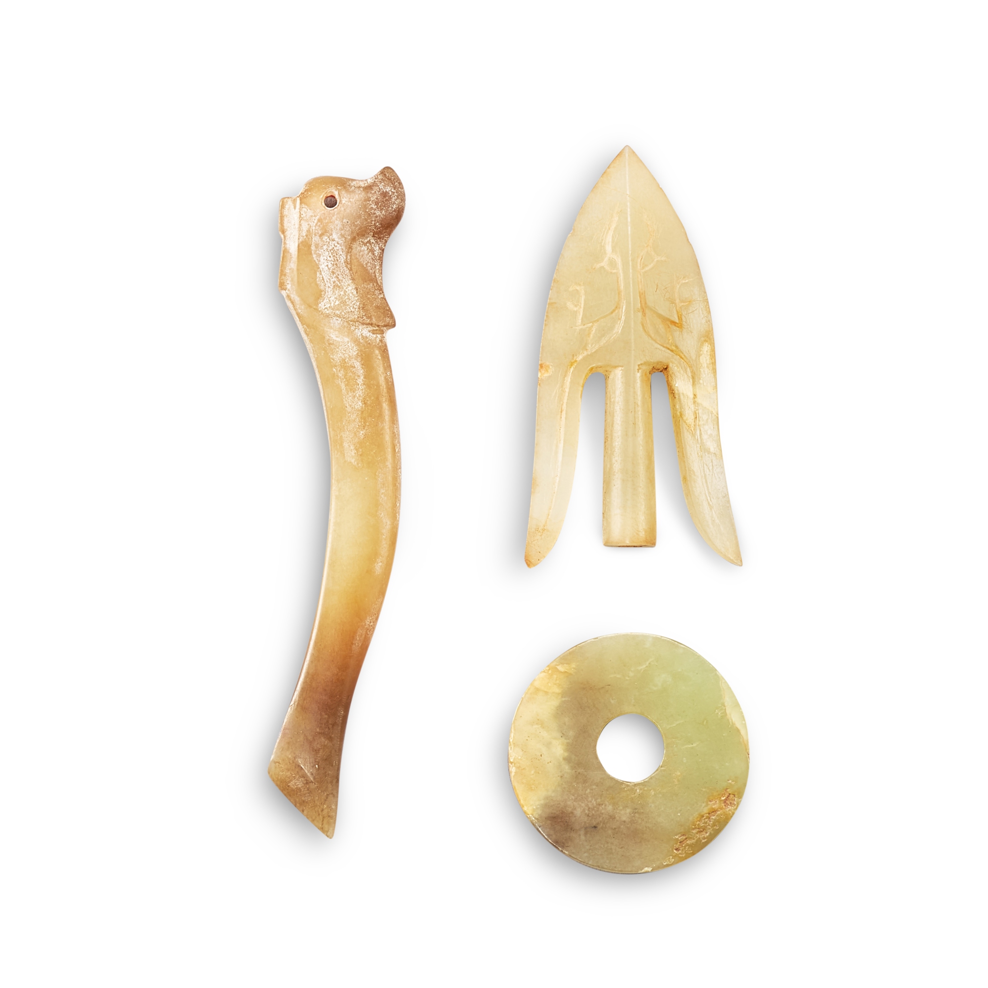 A group of three jade carvings, — A group of three jade carvings, Western Zhou dynasty or later 西周或更晚 玉璧、箭簇、龍形觽一組三件