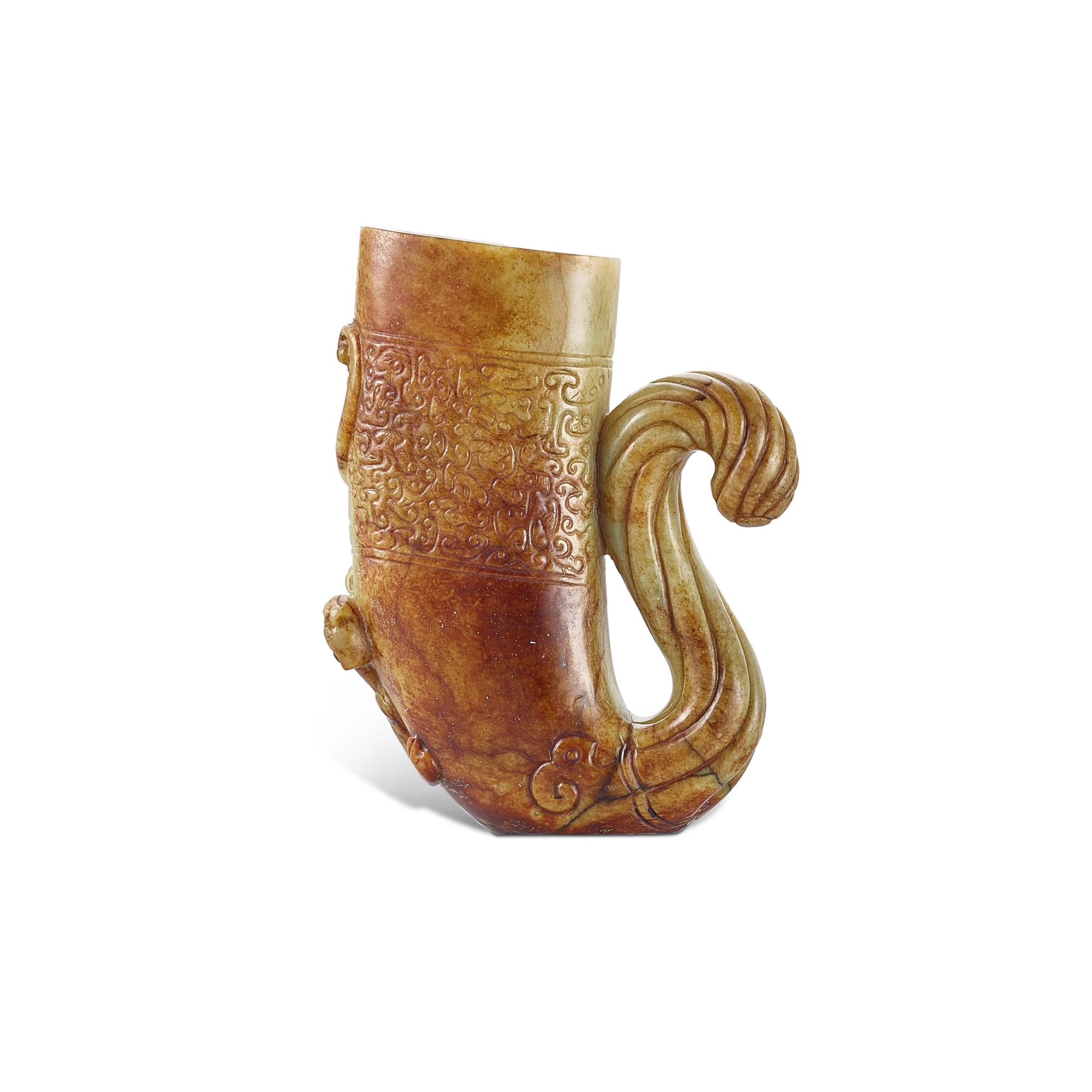 An archaistic celadon and russet jade 'chilong' rhyton, gong, — An archaistic celadon and russet jade 'chilong' rhyton, gong, Late Ming – early Qing dynasty 明末清初 褐斑青玉仿古螭龍紋觥
