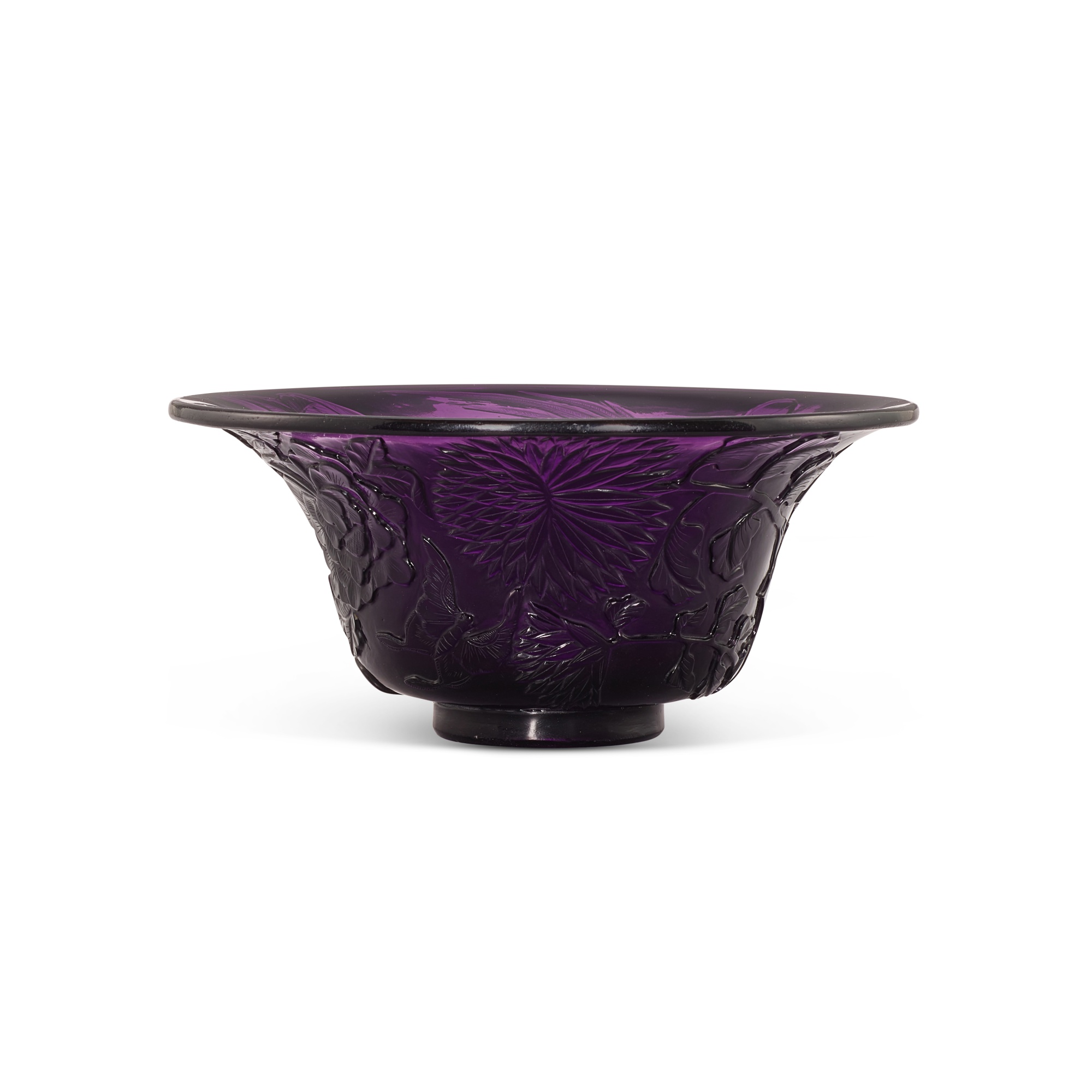A purple glass 'peacock and peony' bowl, — A purple glass 'peacock and peony' bowl, Mark and period of Qianlong 清乾隆 透明紫料孔雀牡丹紋撇口盌 《乾隆年製》款