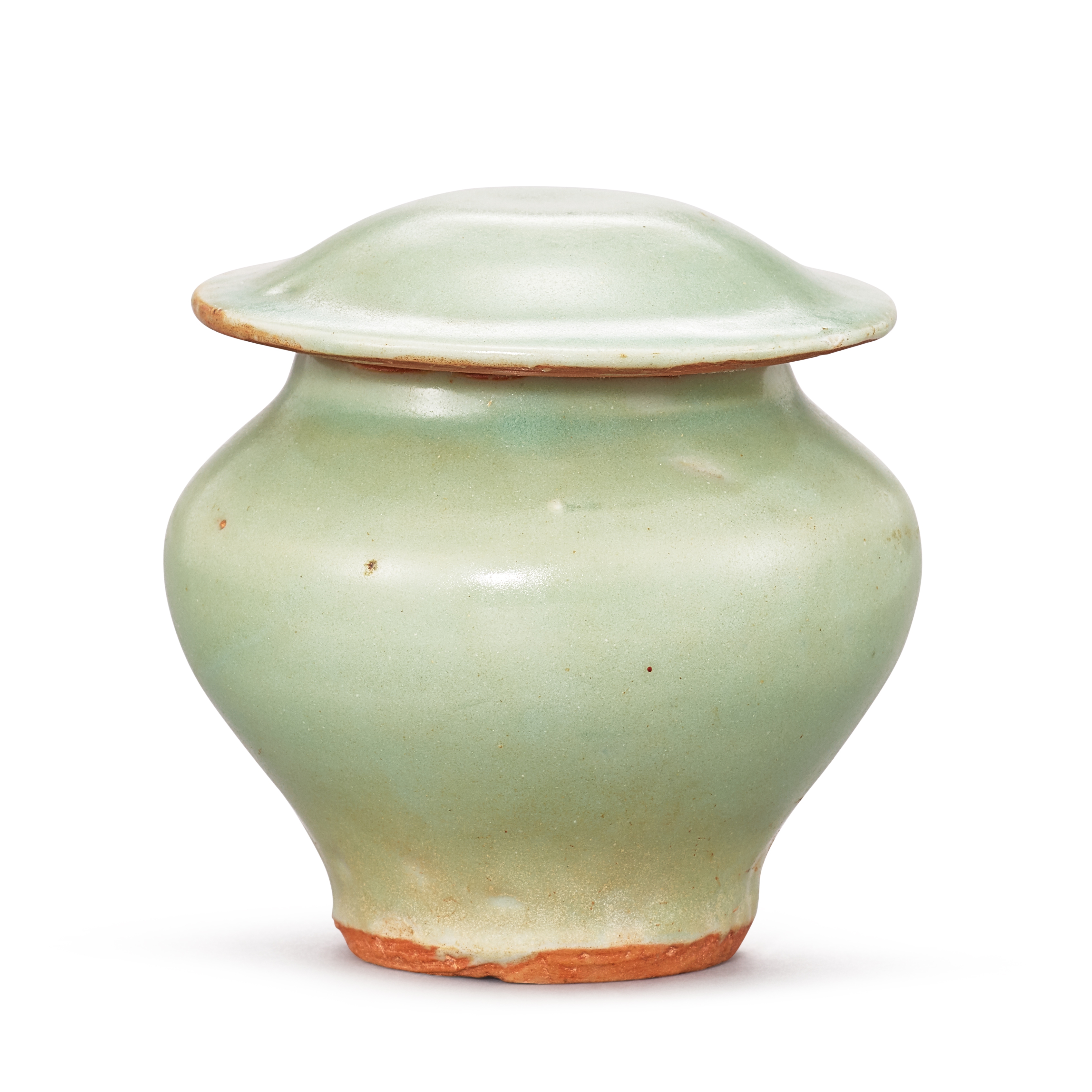 A Longquan celadon jarlet and cover, — A Longquan celadon jarlet and cover, Yuan - Ming dynasty 元至明　龍泉青釉小蓋罐