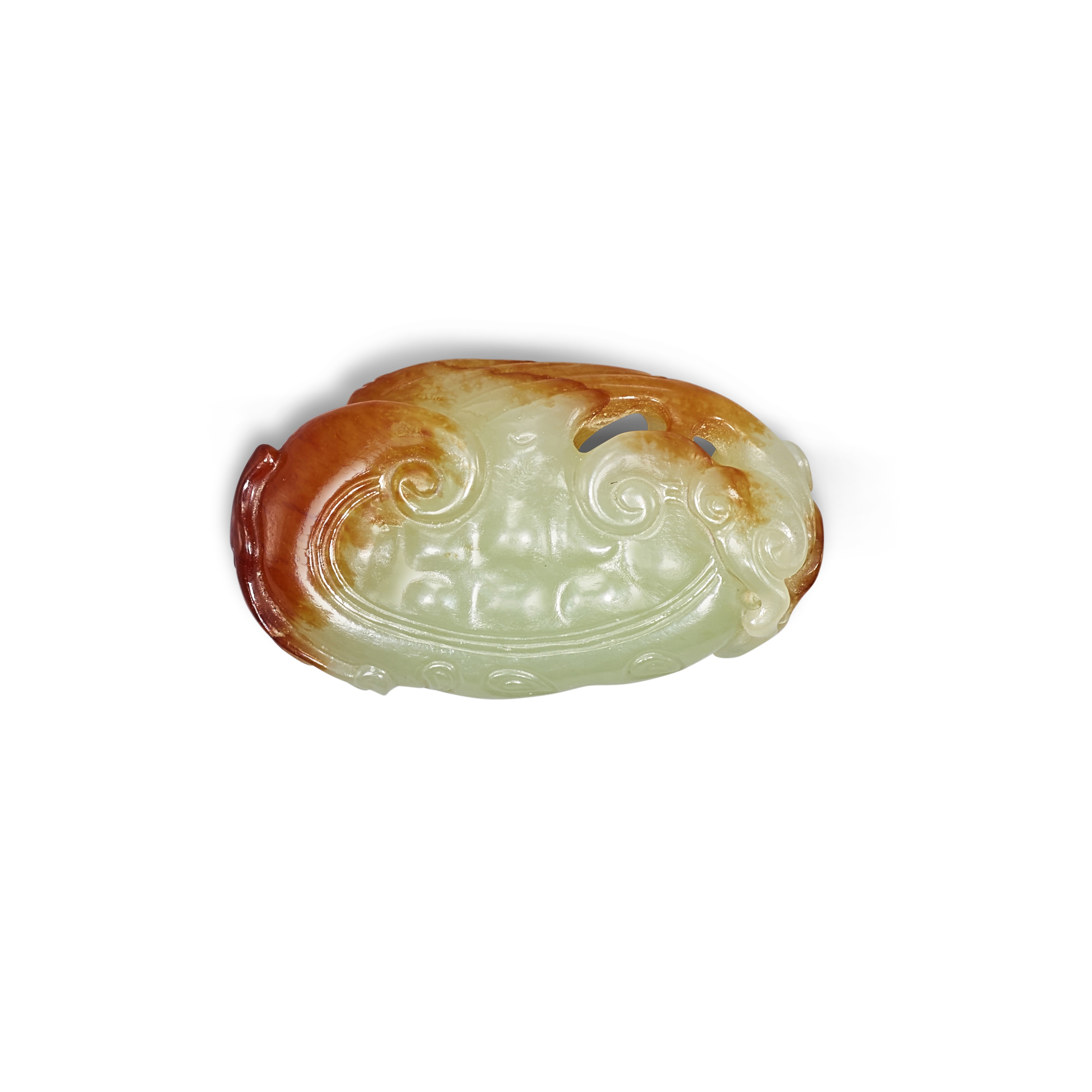 A yellow and russet jade ‘lingzhi’ pendant, — A yellow and russet jade ‘lingzhi’ pendant, Qing dynasty 清　黃玉靈芝