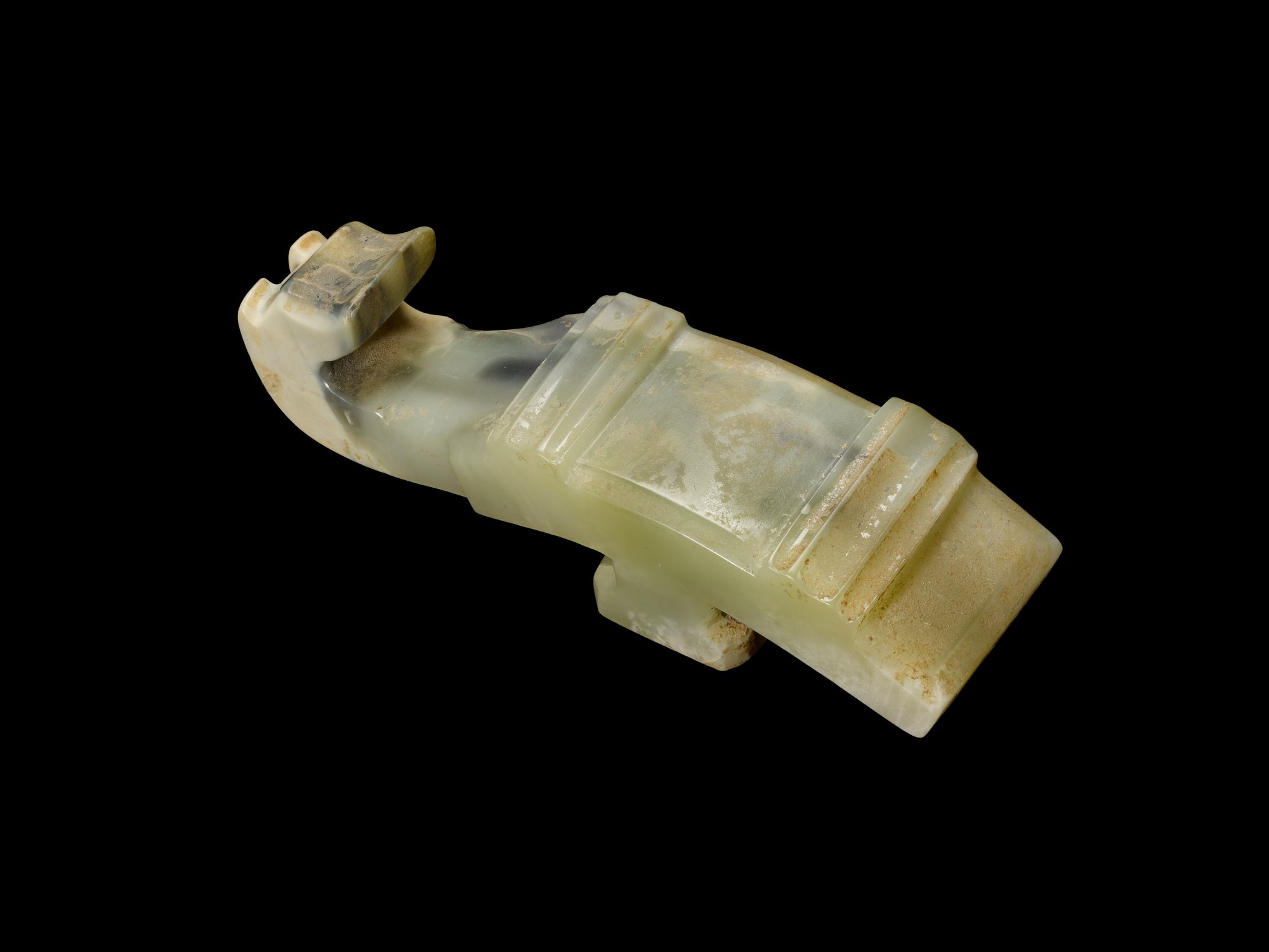 A jade 'animal' belt hook, — 漢 玉獸首帶鉤