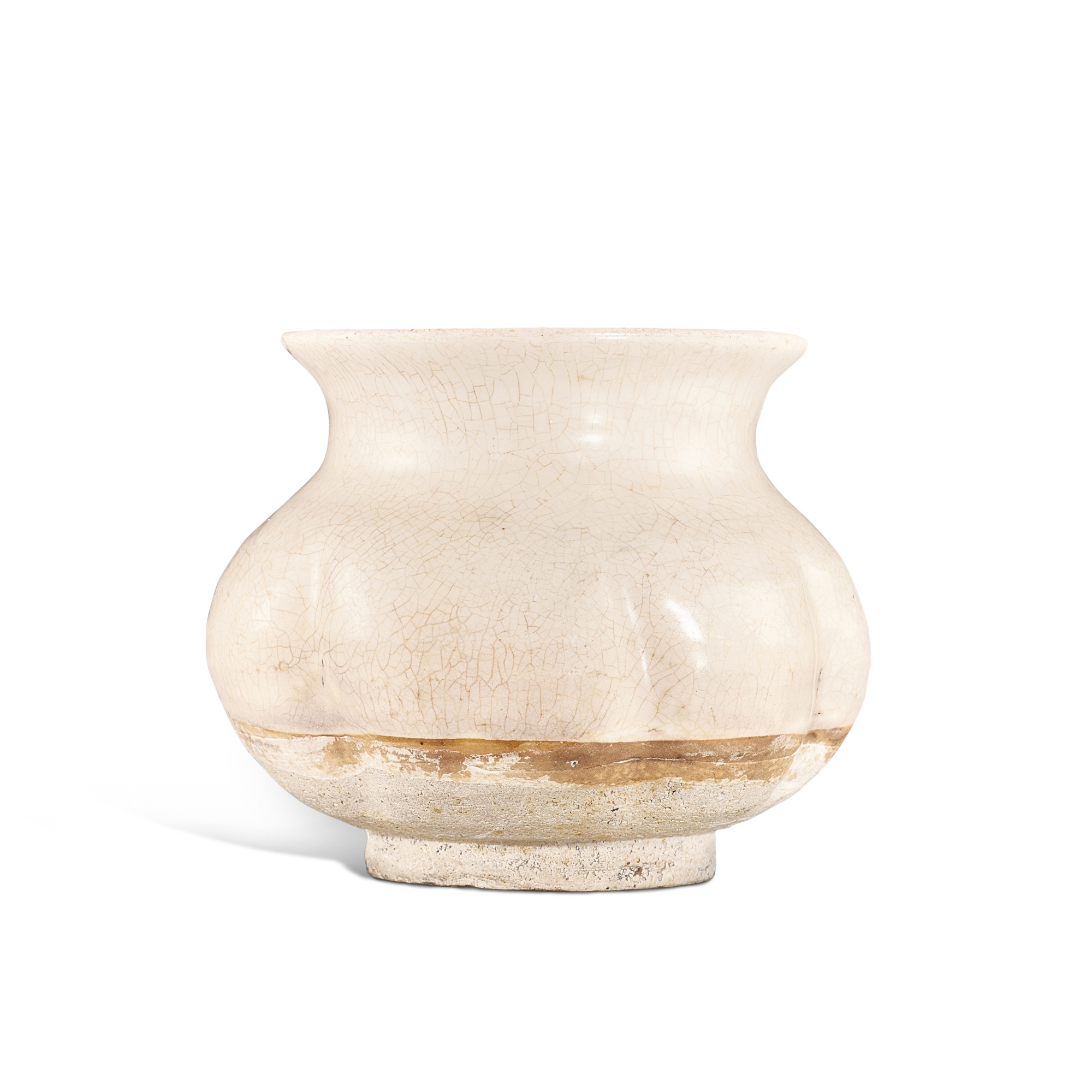 A Cizhou white-glazed 'melon' jar, — 北宋 磁州白釉瓜棱罐