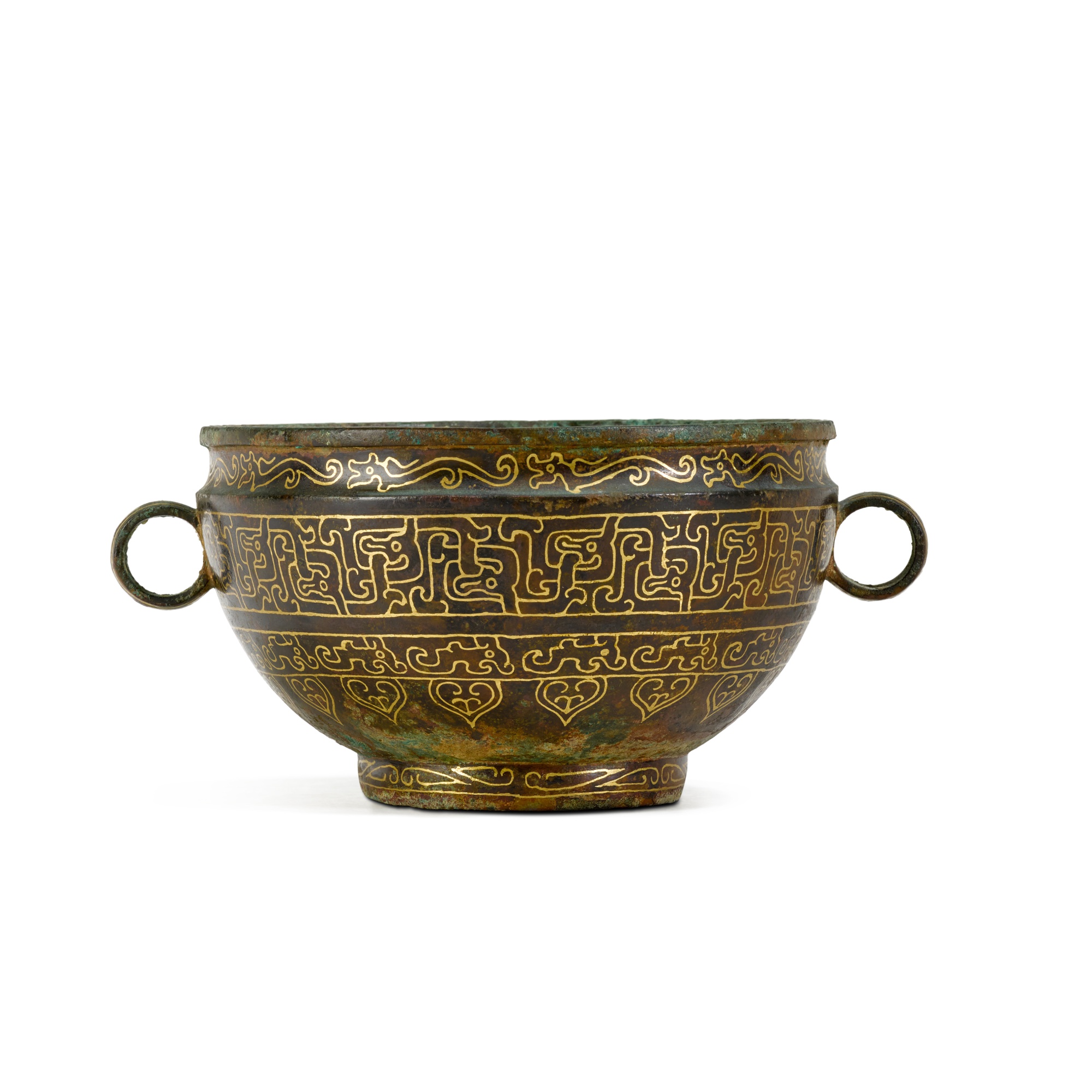 An oval bronze handled vessel, — An oval bronze handled vessel, Eastern Zhou dynasty, Spring and Autumn period, the gilded decoration applied in the 20th century 東周春秋時期 銅夔龍紋敦 描金為二十世紀後加