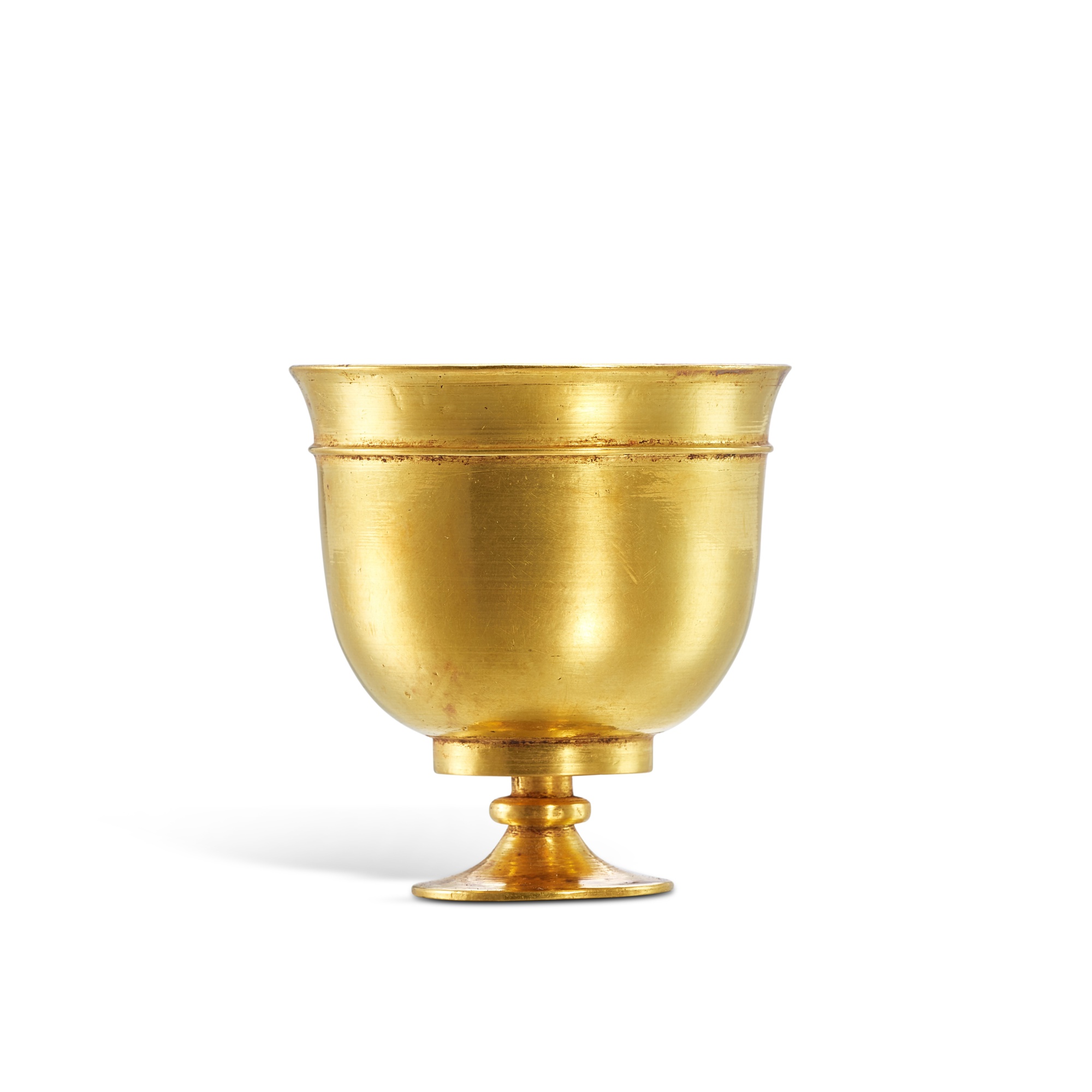 A rare gold stem cup, — A rare gold stem cup, Tang dynasty 唐 金高足盃