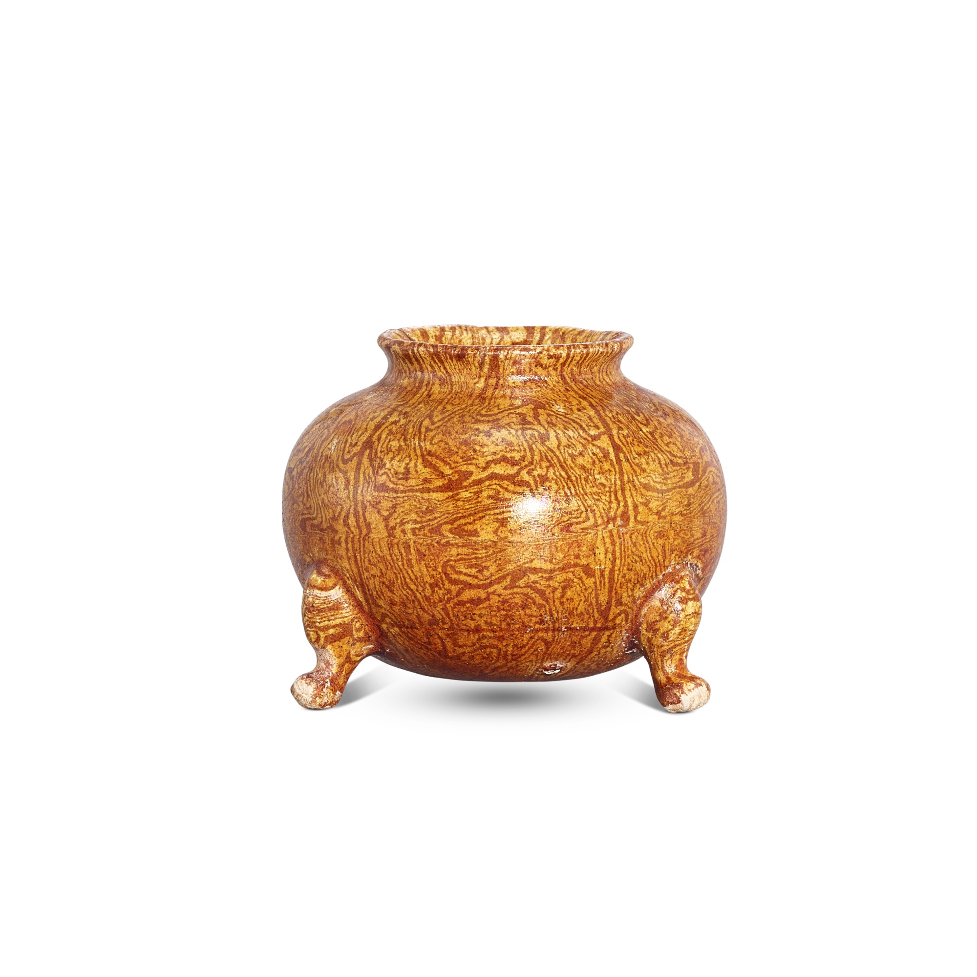 An amber-glazed marbled tripod jar, Tang dynasty 唐 琥珀釉絞胎三足鬲