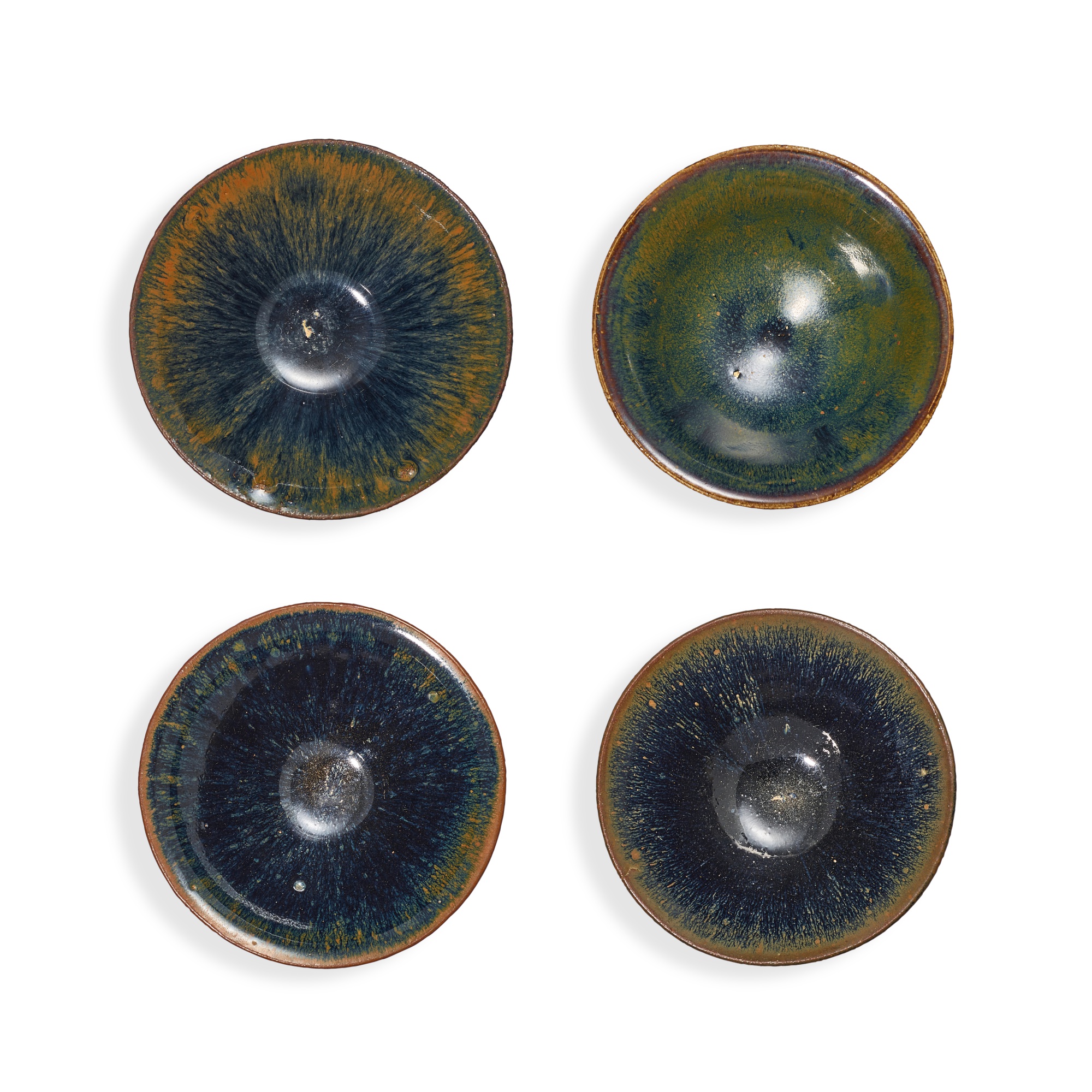 Three Jian black-glazed teabowls and a Henan black-glazed teabowl, — Three Jian black-glazed teabowls and a Henan black-glazed teabowl, Song dynasty 宋 建窰黑釉茶盞三件及河南黑釉盌一件