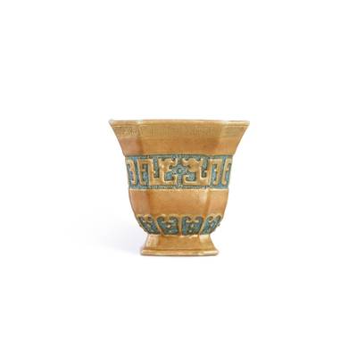 A rare gilt-decorated trompe l'oeil bronze-imitation archaistic 'chilong' square cup, Qing dynasty, 19th century 清十九世紀 瓷胎仿銅釉螭龍紋四方倭角盃