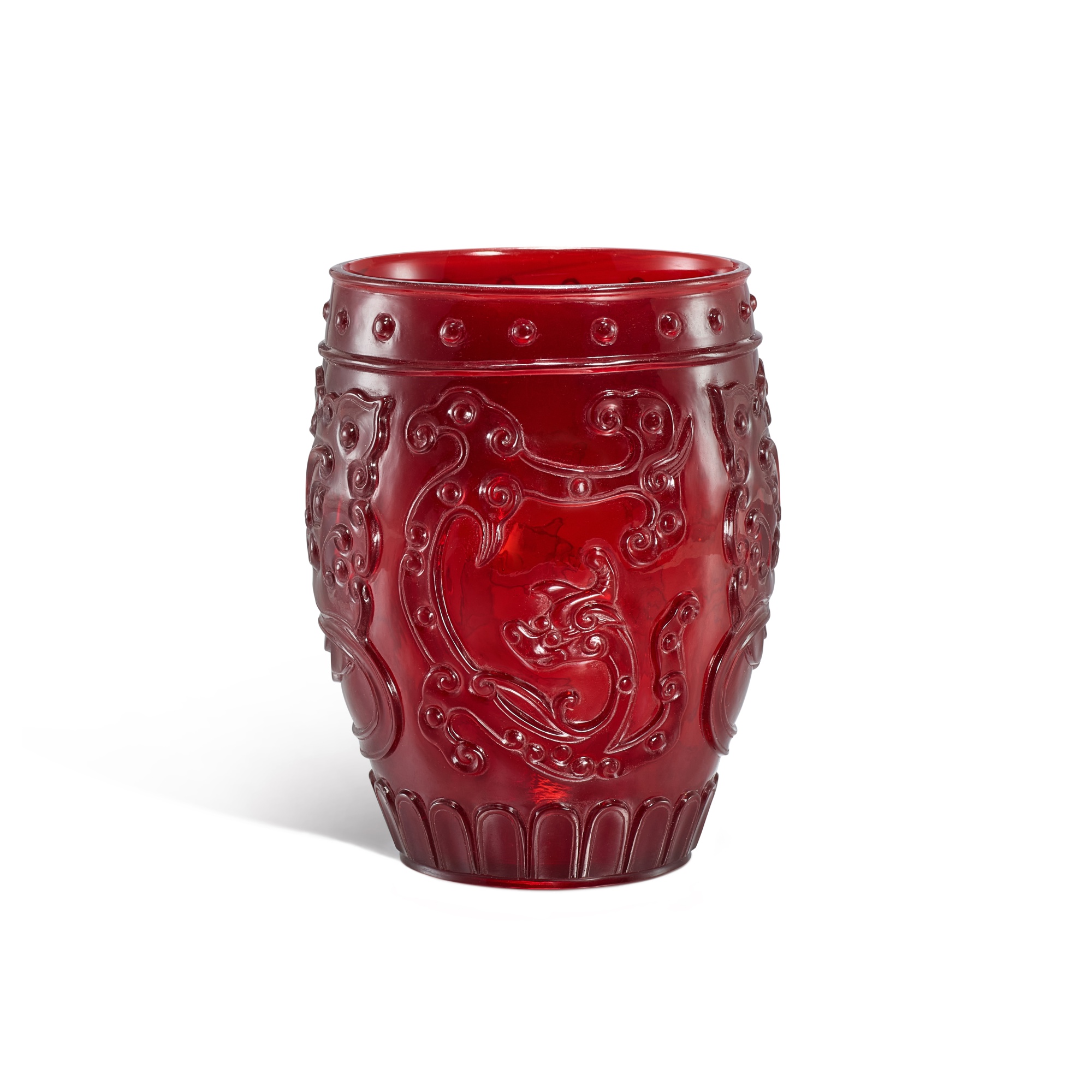 An imperial ruby-red glass archaistic 'chilong' cup, — An imperial ruby-red glass archaistic 'chilong' cup, Seal mark and period of Qianlong 清乾隆 御製寶石紅料仿古螭龍鋪首紋盃 《乾隆年製》款