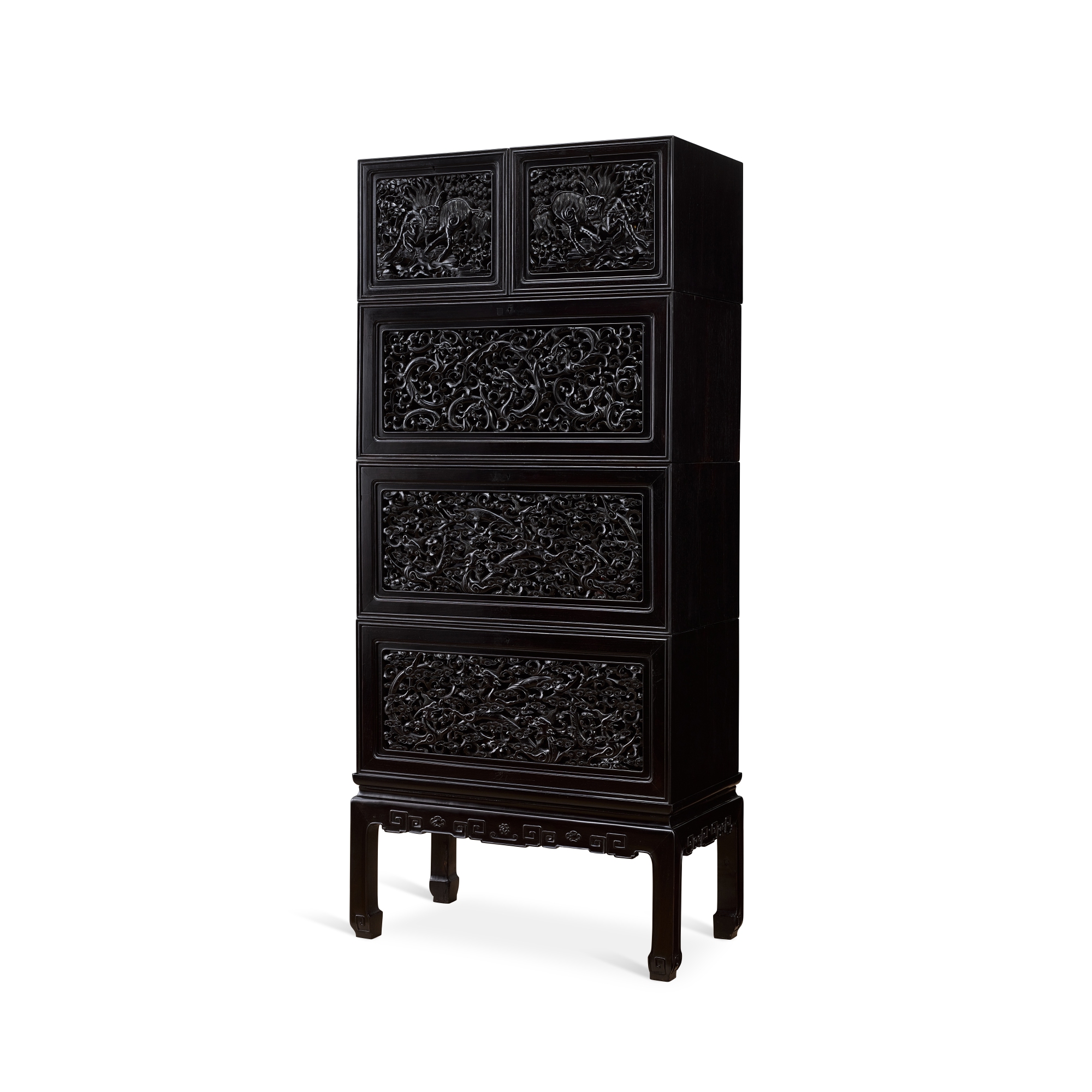 A reticulated zitan and blackwood 'dragon' cabinet, — 清十九世紀 紫檀配黑木透雕雲龍紋四層櫃