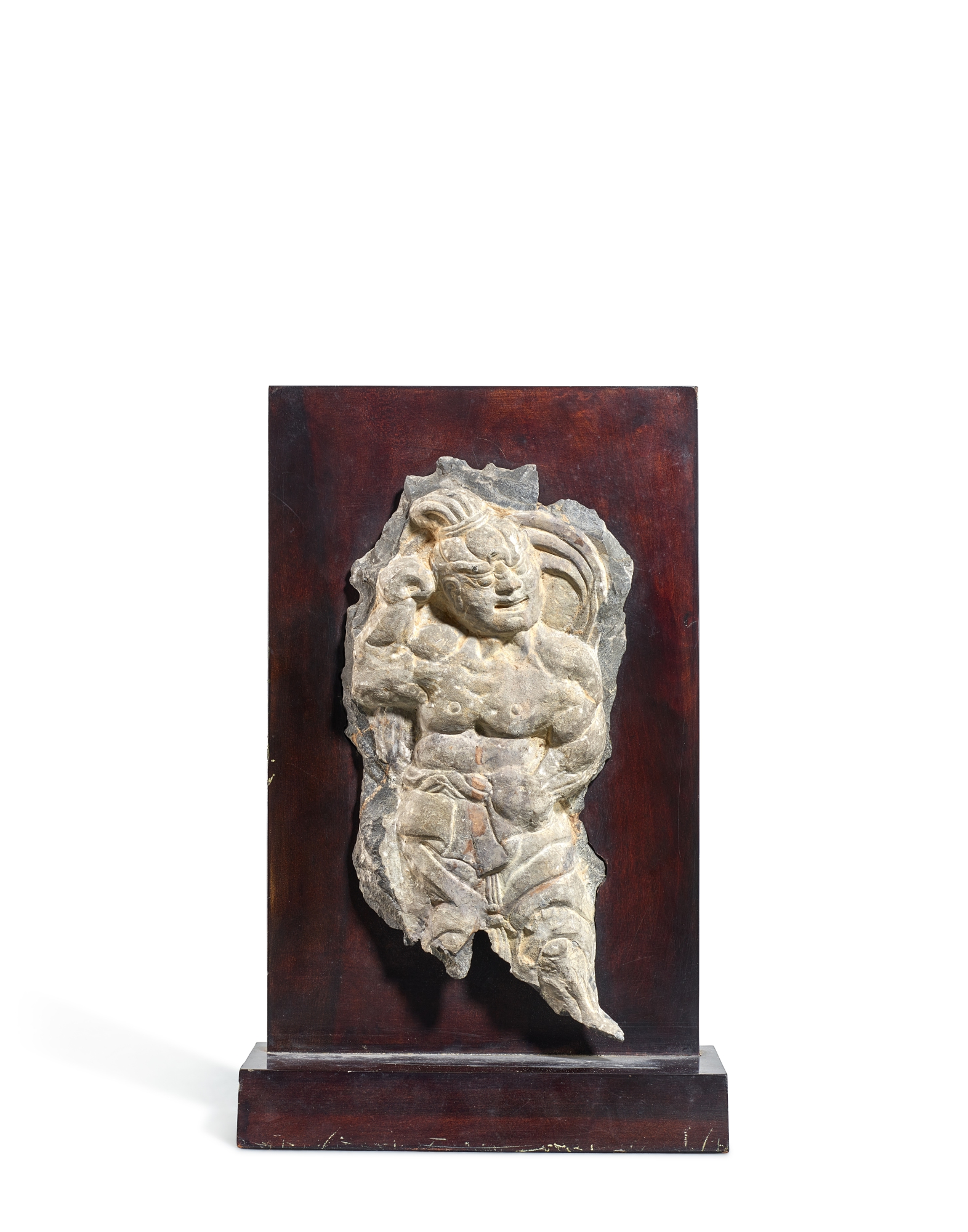 A limestone fragmentary relief of a guardian, — 唐　石灰岩雕力士殘像