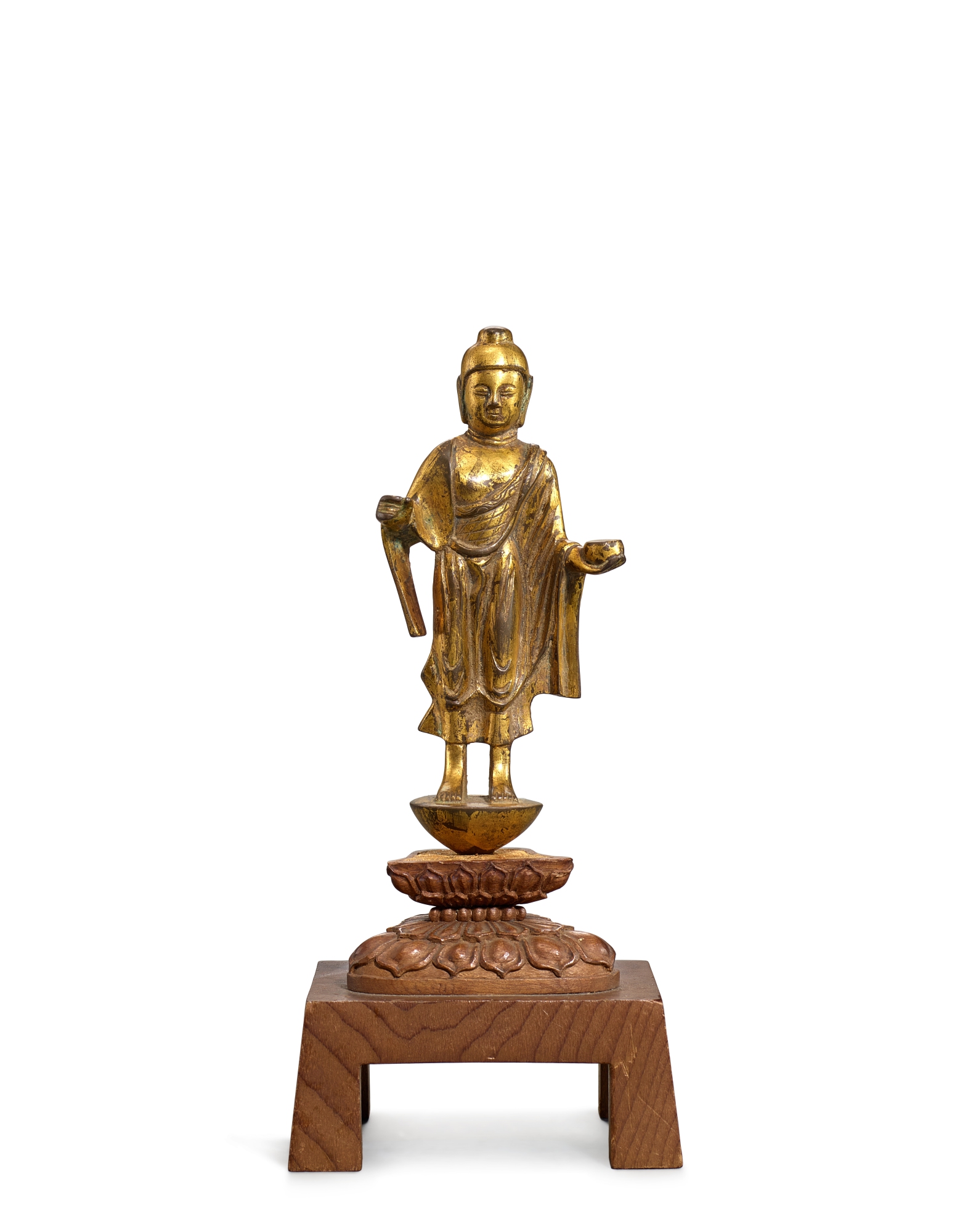 A small gilt-bronze figure of Buddha, — 唐　鎏金銅立佛像