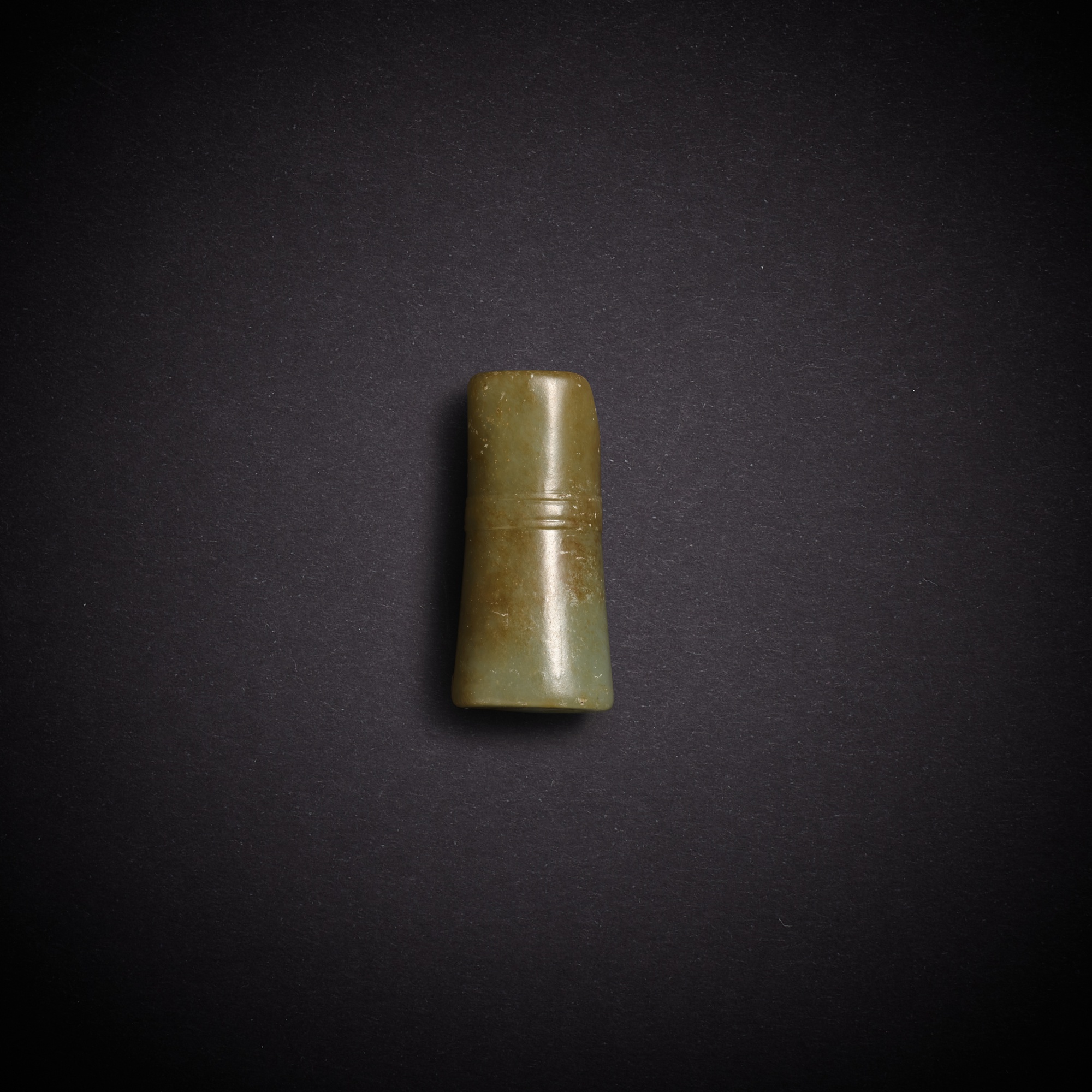 A celadon jade tube — 商 青玉管