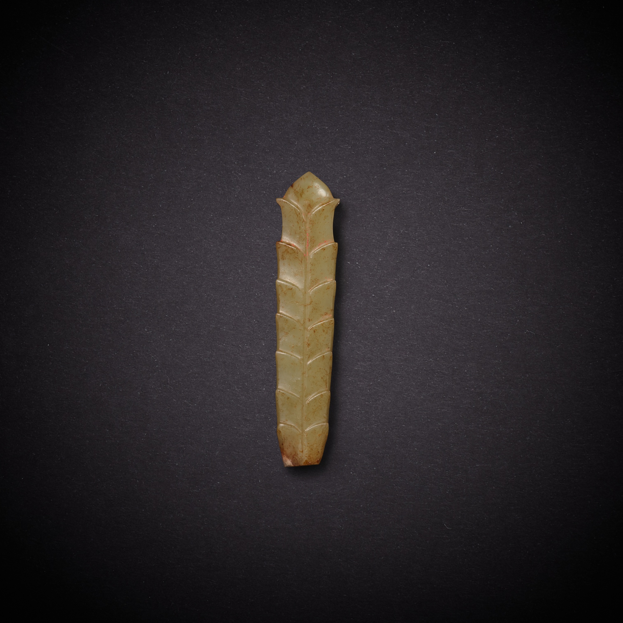A yellowish-celadon jade handle — 西周 青黃玉柄