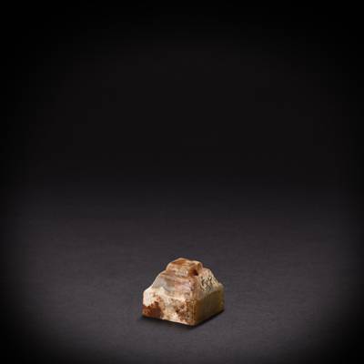 An inscribed celadon jade seal