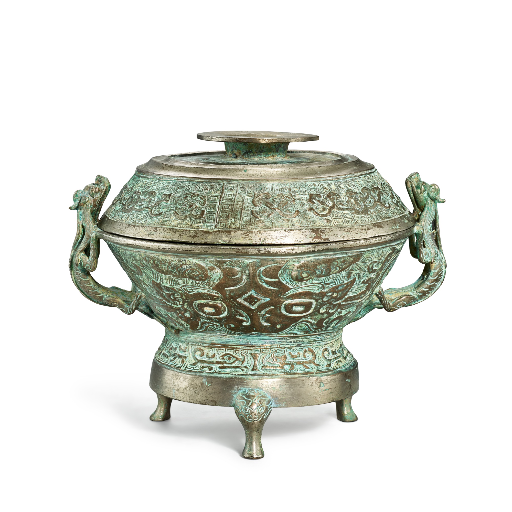 An inscribed silver-gilt bronze archaistic food vessel and cover, gui — 明 銅鎏銀仿古獸面紋簋及蓋