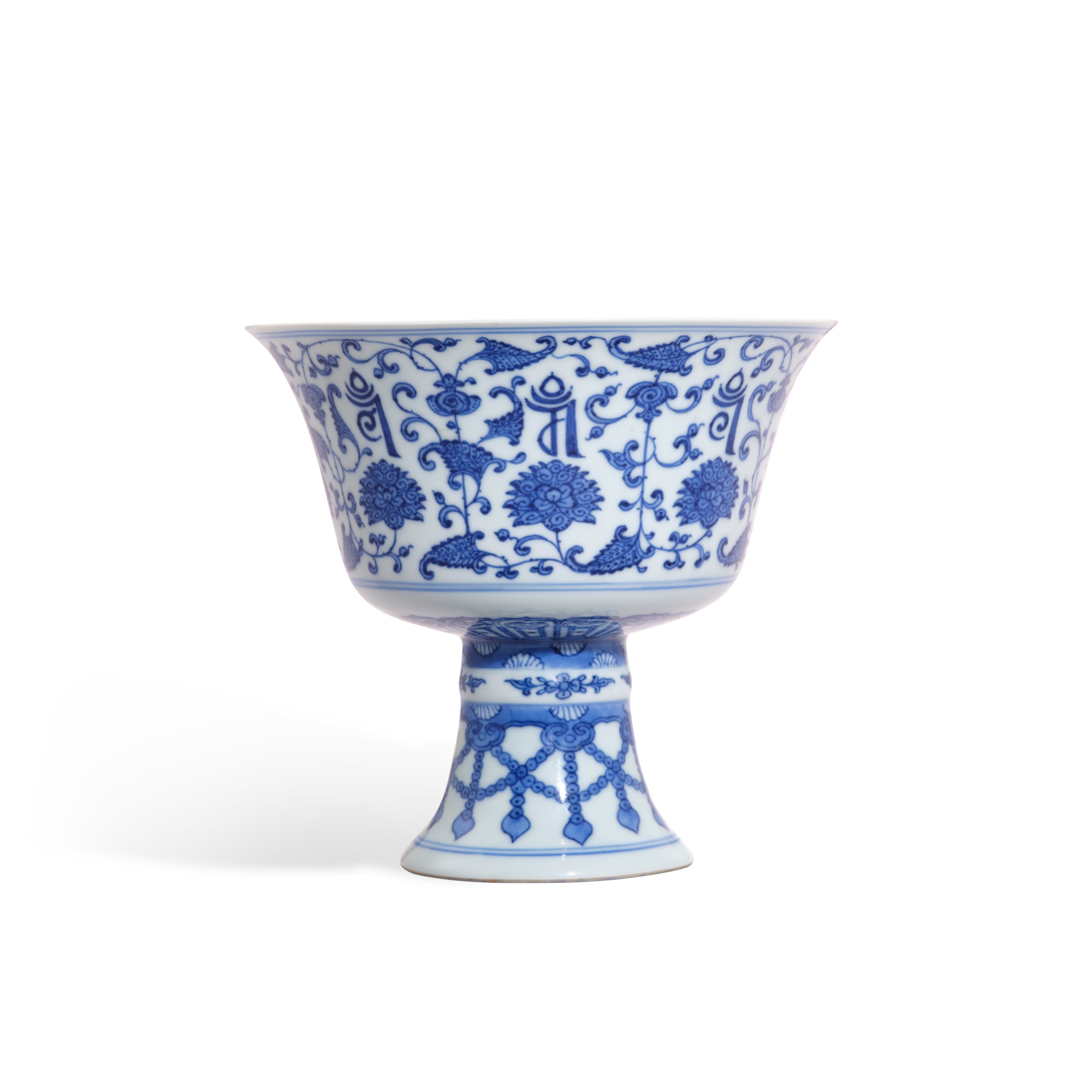 A blue and white 'lança' stem cup — 清乾隆 青花梵紋纏枝番蓮紋高足盌 《大清乾隆年製》款