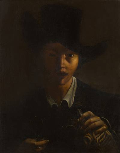 A young boy with a hat holding a wine glass and bottle