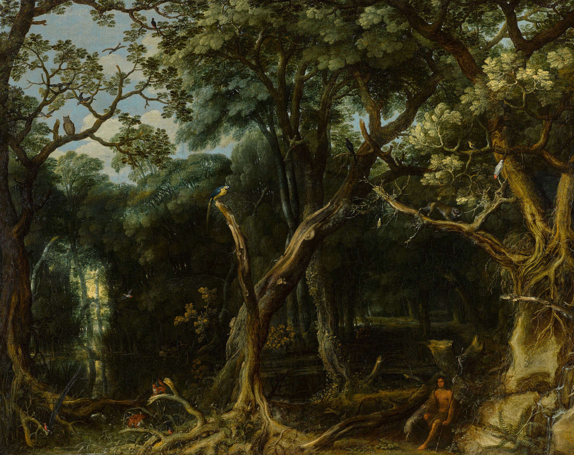 Frederick van Valckenborch — A wooded landscape with Saint John the Baptist