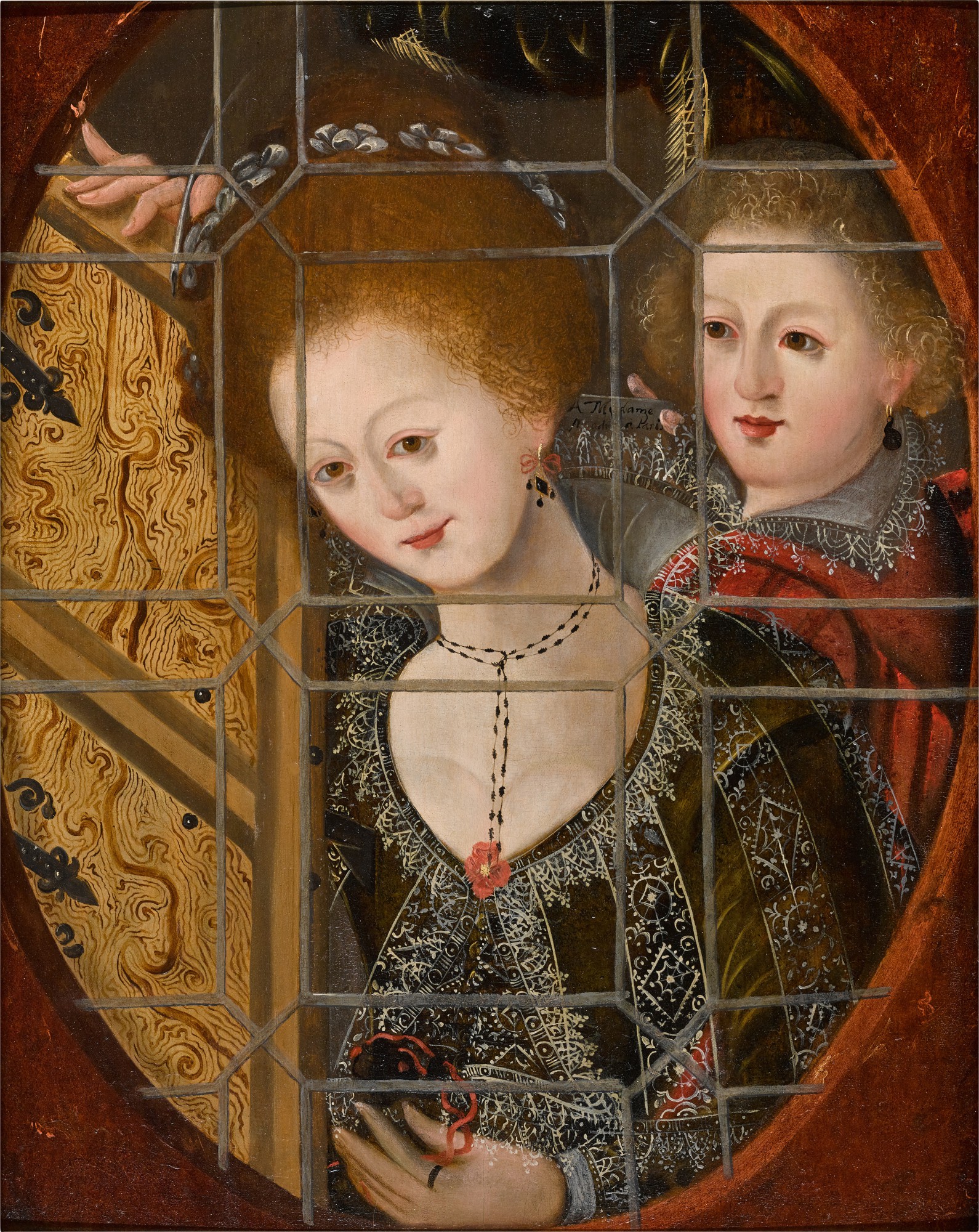French School, circa 1600 — Two young lovers behind a trompe l'œil window