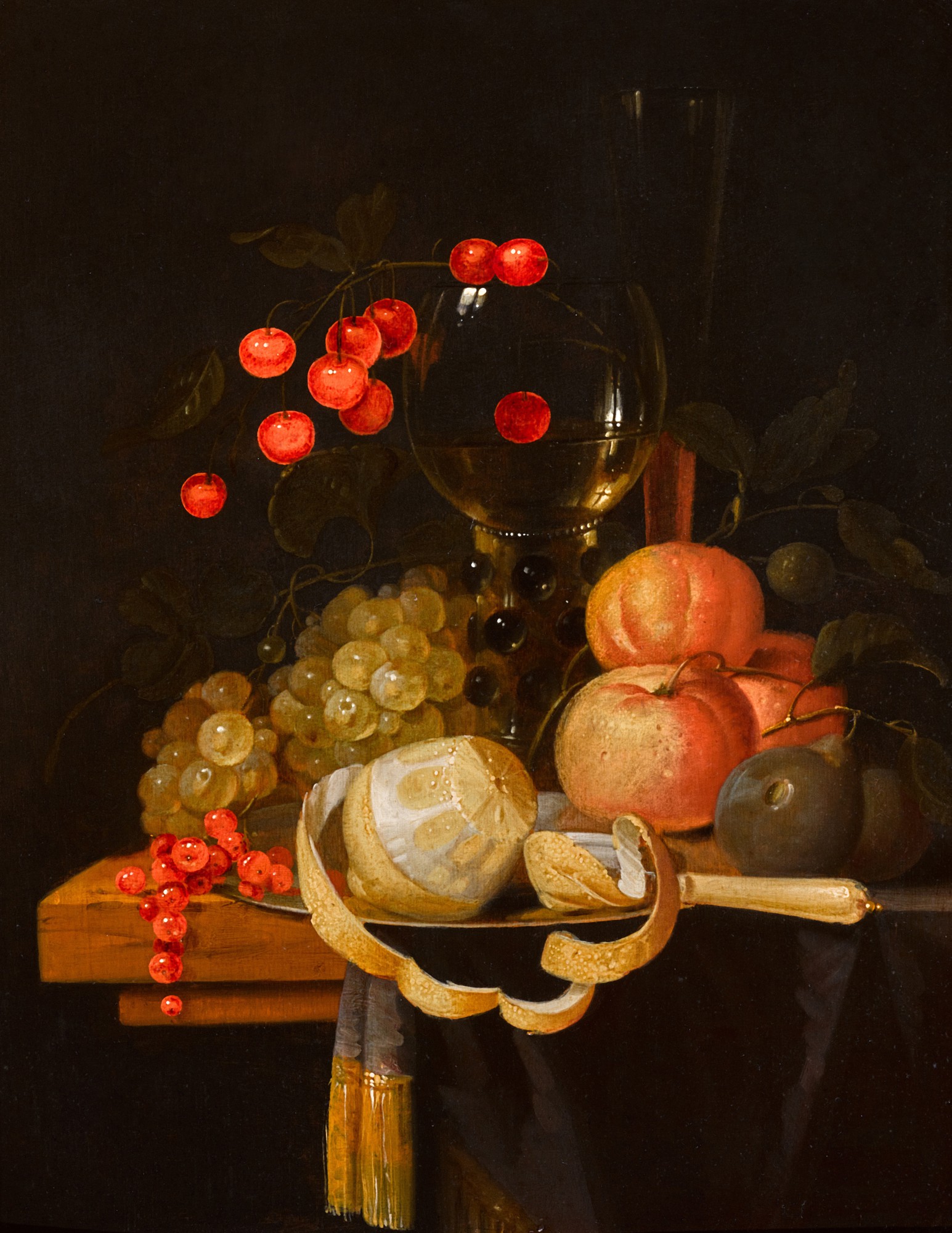 Jacob Verhagen — Still life with grapes, oranges, cherries, a roemer, a plum, a lemon and redcurrants, with a knife on a pewter plate, on a wooden table