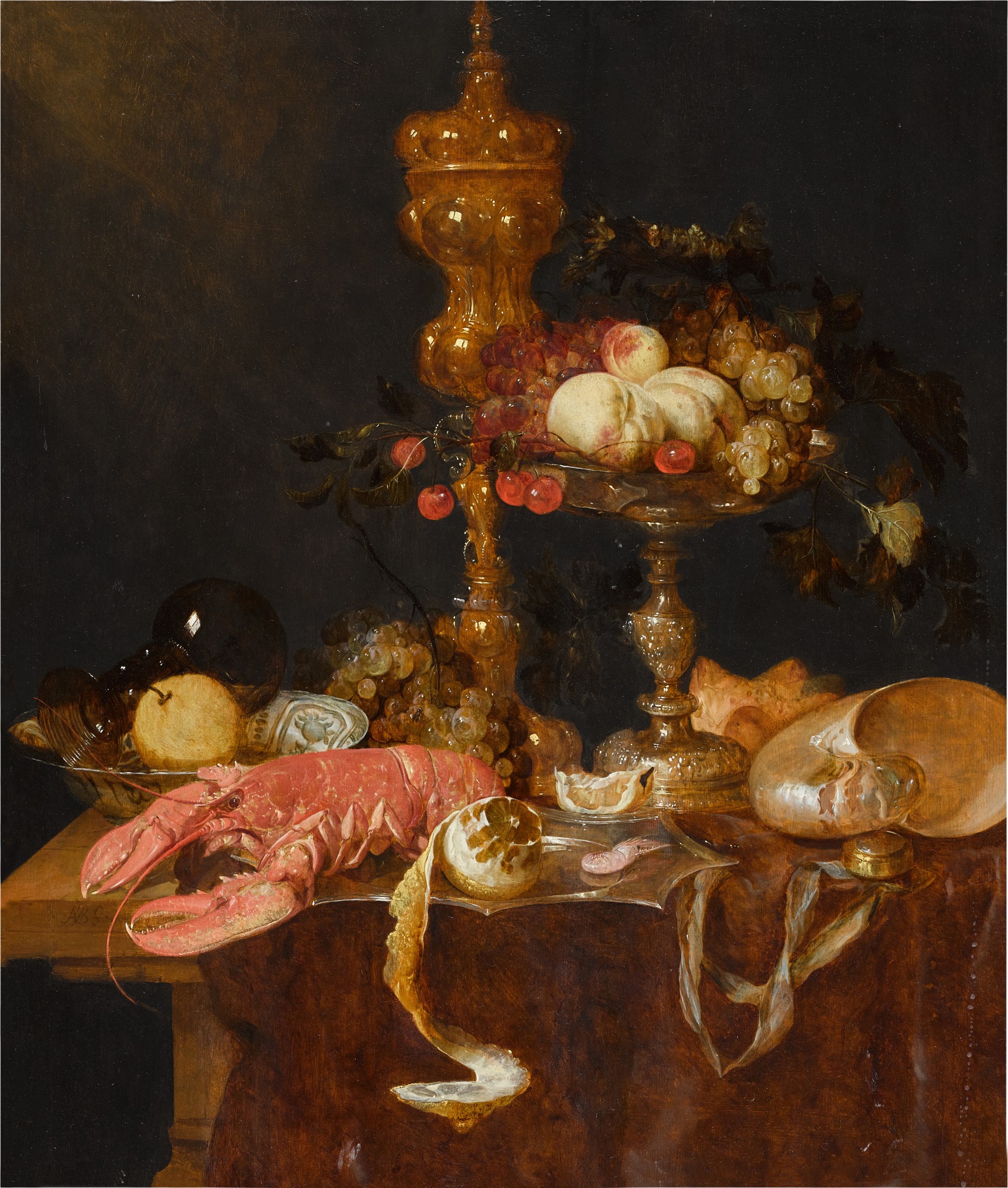 Abraham van Beijeren — A still life with a lobster, a gilt cup, a tazza, a shell, a Wan-Li bowl and a clock, together with a lemon, grapes, peaches and cherries