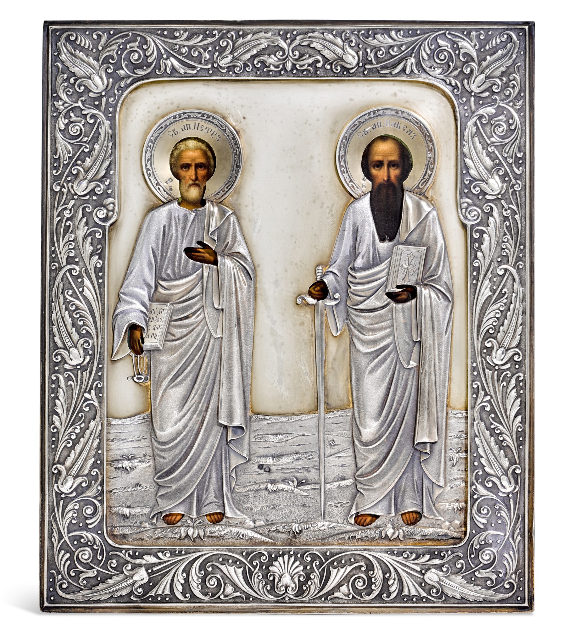 A Russian parcel-gilt silver icon of Apostles Peter and Pavel, maker's mark Cyrillic 'IV', Moscow, 1908-1917 — A Russian parcel-gilt silver icon of Apostles Peter and Pavel, maker's mark Cyrillic 'IV', Moscow, 1908-1917