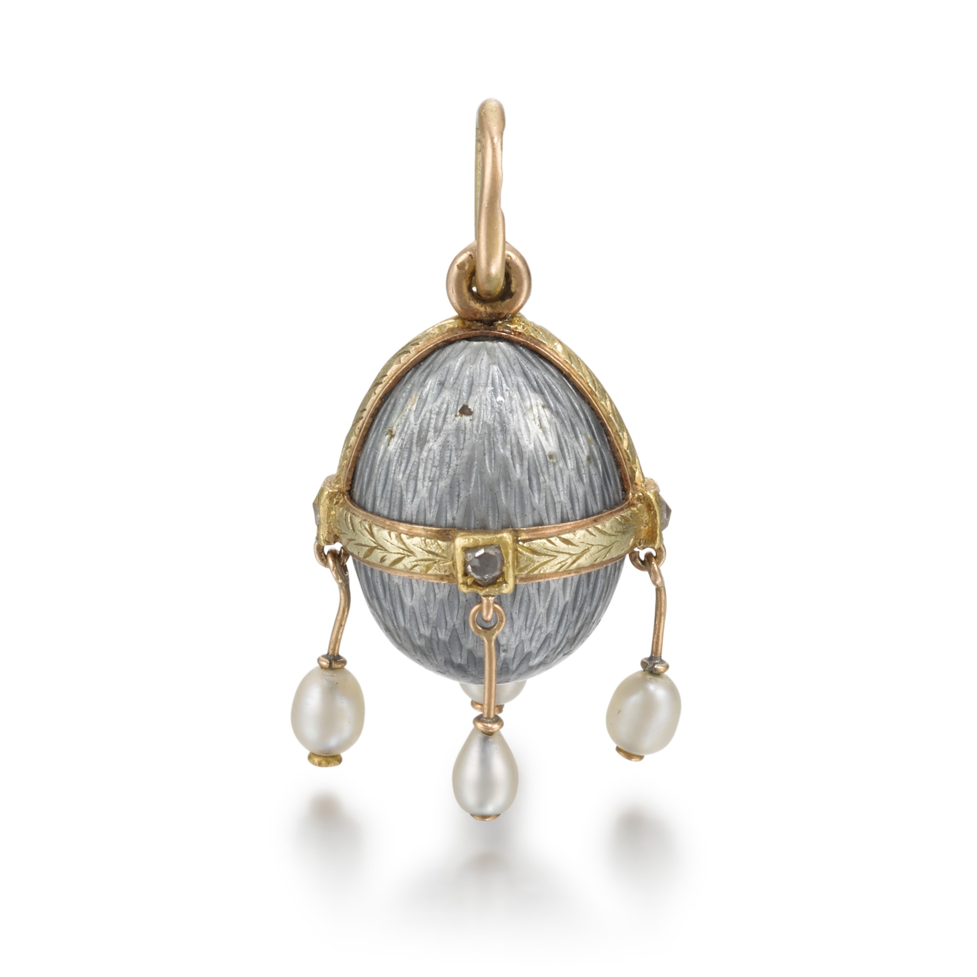 A Fabergé jewelled varicoloured gold and guilloché enamel egg pendant, workmaster Henrik Wigström, St Petersburg, circa 1900 — A Fabergé jewelled varicoloured gold and guilloché enamel egg pendant, workmaster Henrik Wigström, St Petersburg, circa 1900