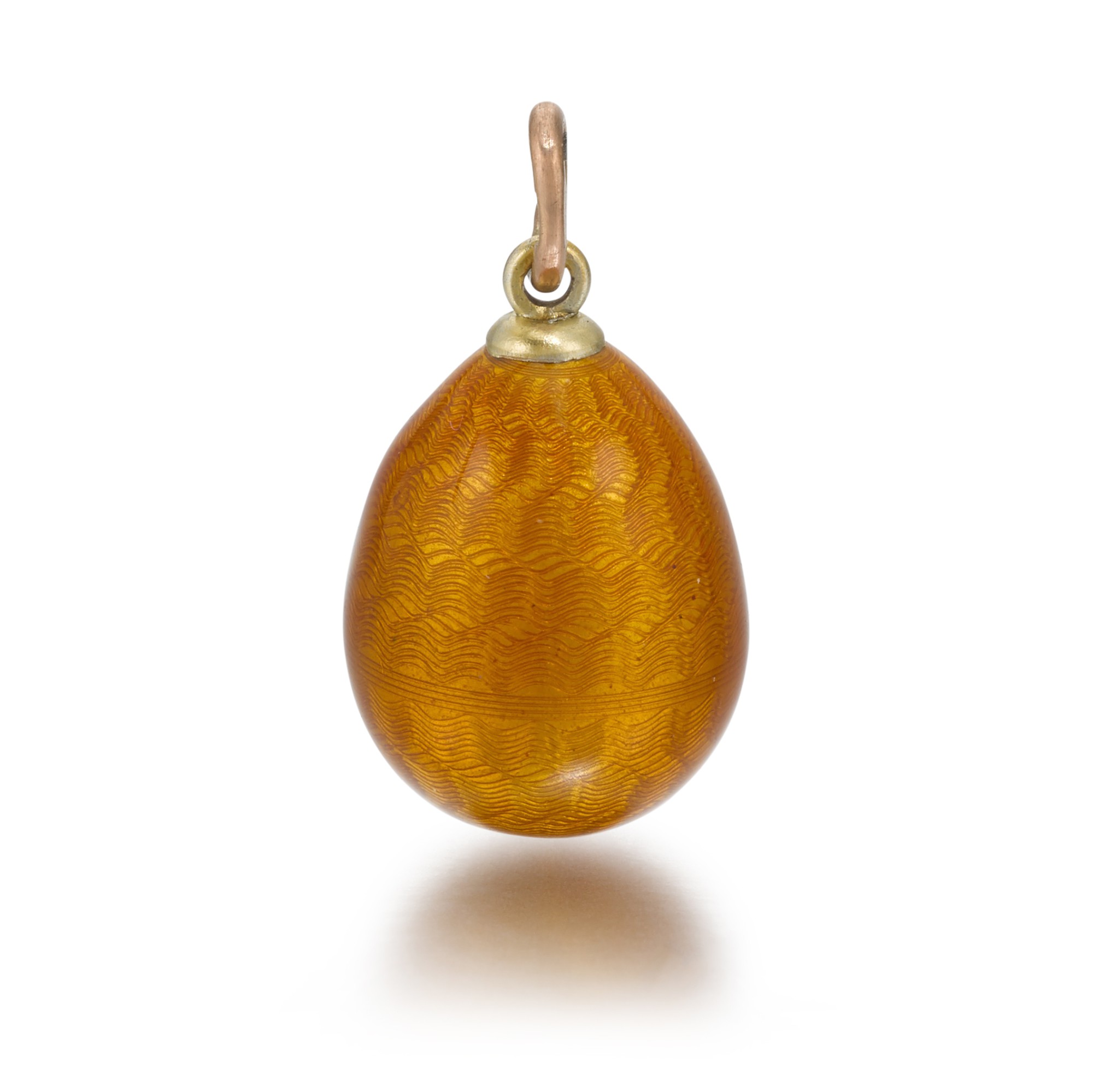A Fabergé gold and guilloché enamel egg pendant, Feodor Afanassiev, St Petersburg, circa 1900 — A Fabergé gold and guilloché enamel egg pendant, Feodor Afanassiev, St Petersburg, circa 1900