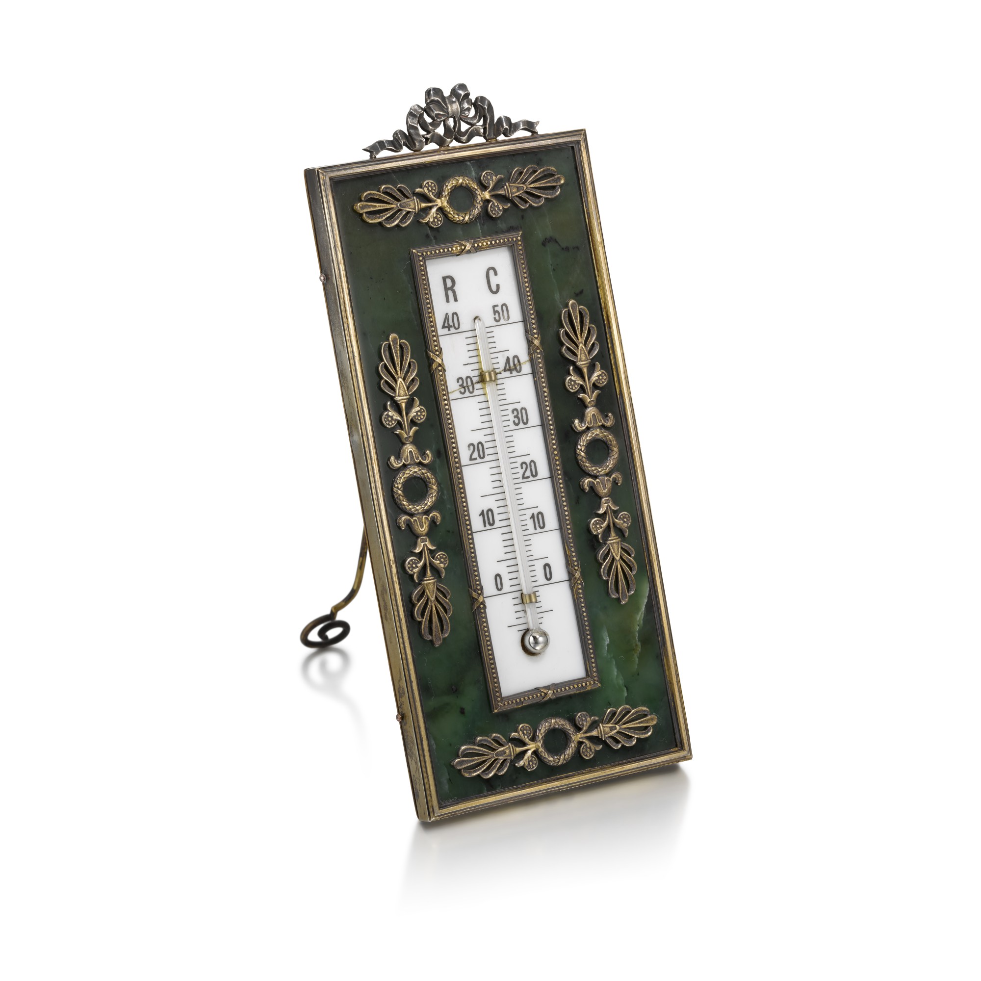 Unknown — A silver-gilt mounted nephrite thermometer in the manner of Fabergé, 20th century  