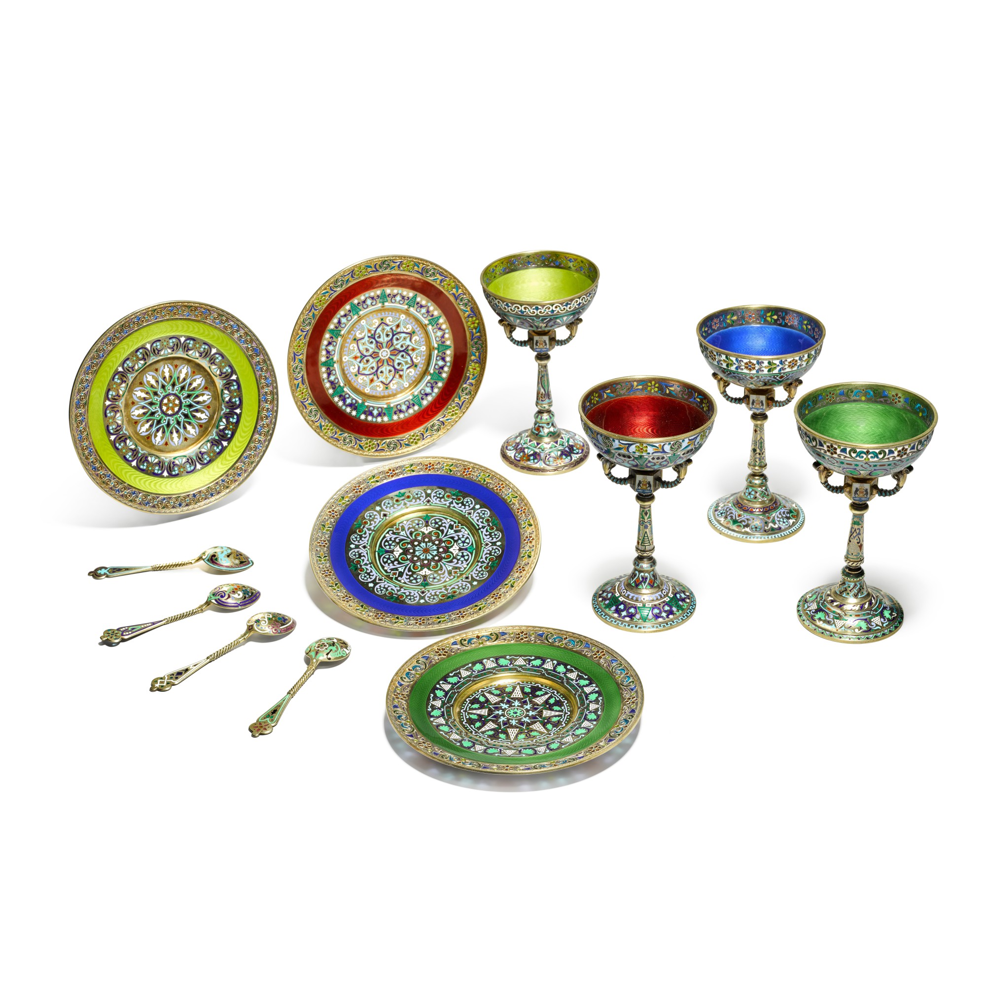 Unknown (Historical) — A set of four silver-gilt plique-à-jour, guilloché and champlevé enamel sherbet cups with stands and spoons, Khlebnikov, Moscow, 1899-1908