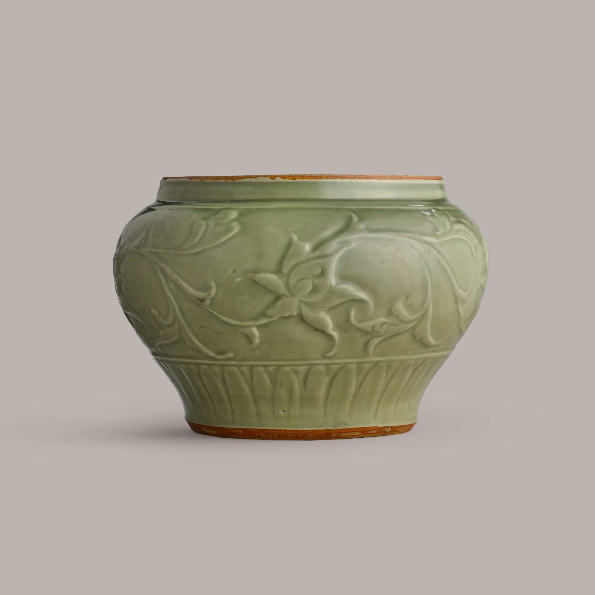 A Longquan celadon 'lotus' jar — 元 龍泉青釉花卉紋大罐
