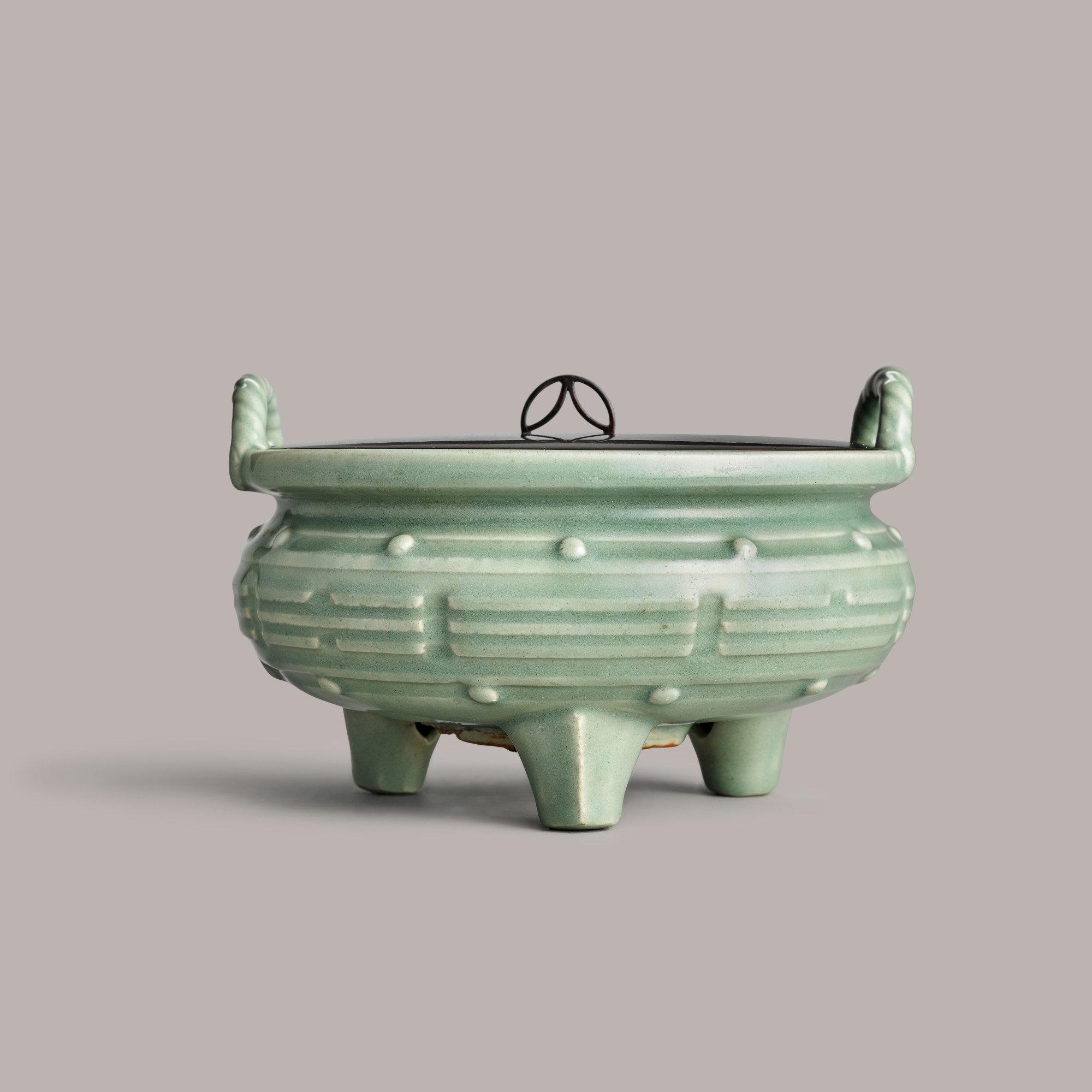 A Longquan celadon tripod censer — 明 龍泉青釉冲耳三足爐